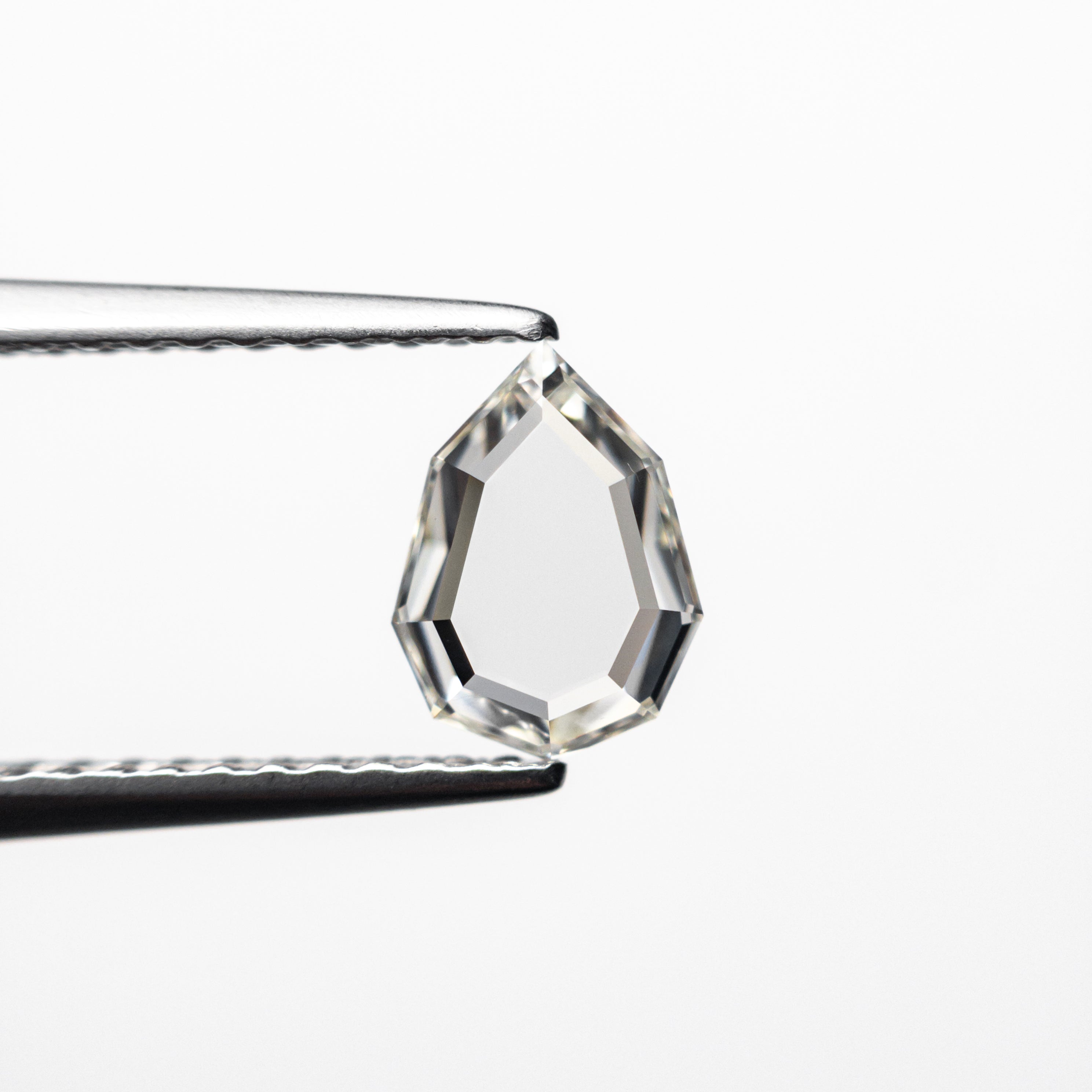 0.57ct Pear-Shaped Diamond (7.13x5.28x1.64mm) VS1 Clarity J Color - Geo Portrait Cut for Engagement Rings & Fine Jewelry