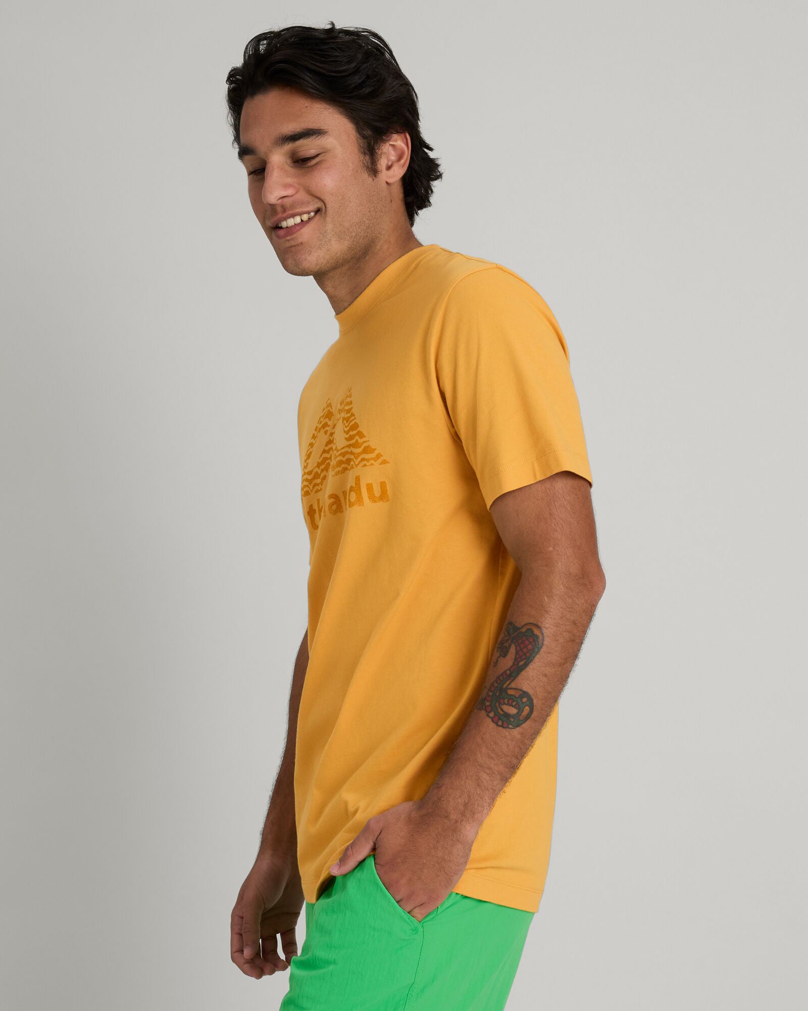 Kathmandu Logo Men's Short Sleeve T-Shirt - Mustard Yellow Cotton Casual Tee for Outdoor Adventures & Streetwear Fashion