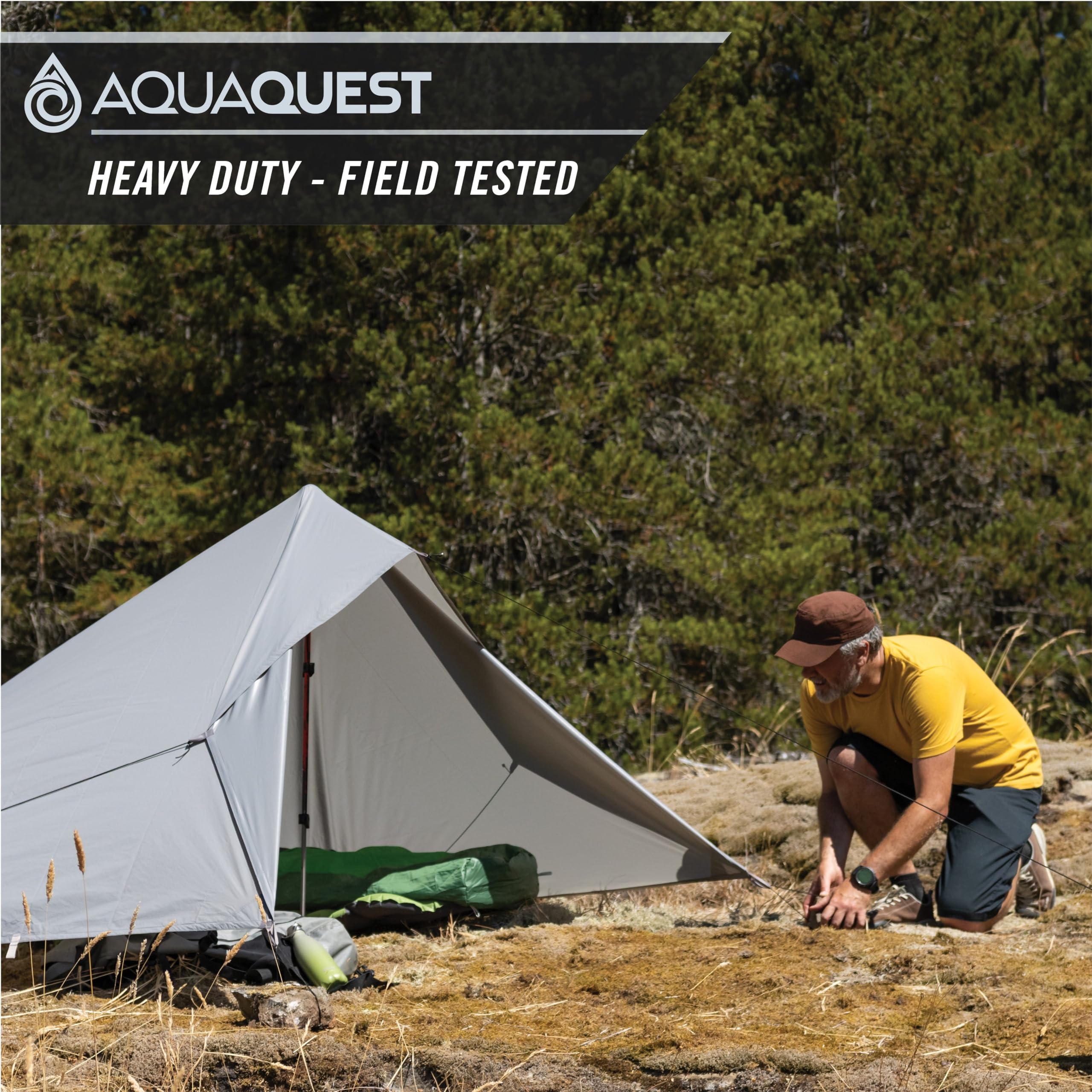 AquaQuest Defender Heavy Duty Waterproof Camping Tarp - All Weather Tent Shelter & Rain Fly for Hiking, Bushcraft, Hammock Camping - Perfect for Outdoor Adventures & Emergency Survival Gear