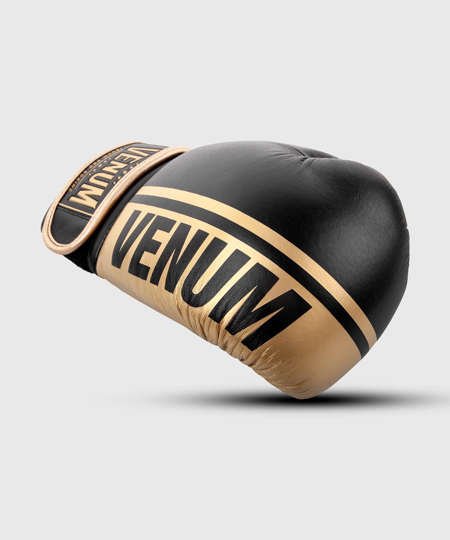 VENUM Shield Pro Boxing Gloves - Professional Training MMA Sparring Gloves with Velcro Closure (Black/Gold) - Perfect for Boxing, Muay Thai, Kickboxing & MMA Training