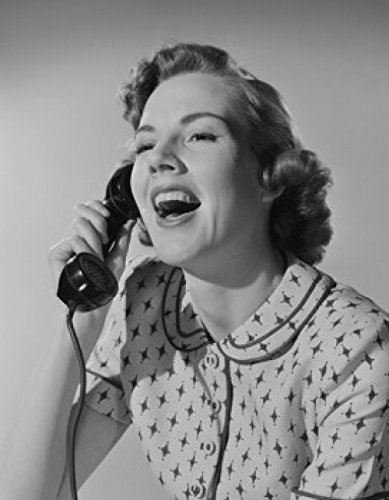 Studio Portrait of Young Woman Talking on Phone - Premium Poster Print 24x36 Inches - Wall Art for Home Office, Bedroom & Living Room Decor