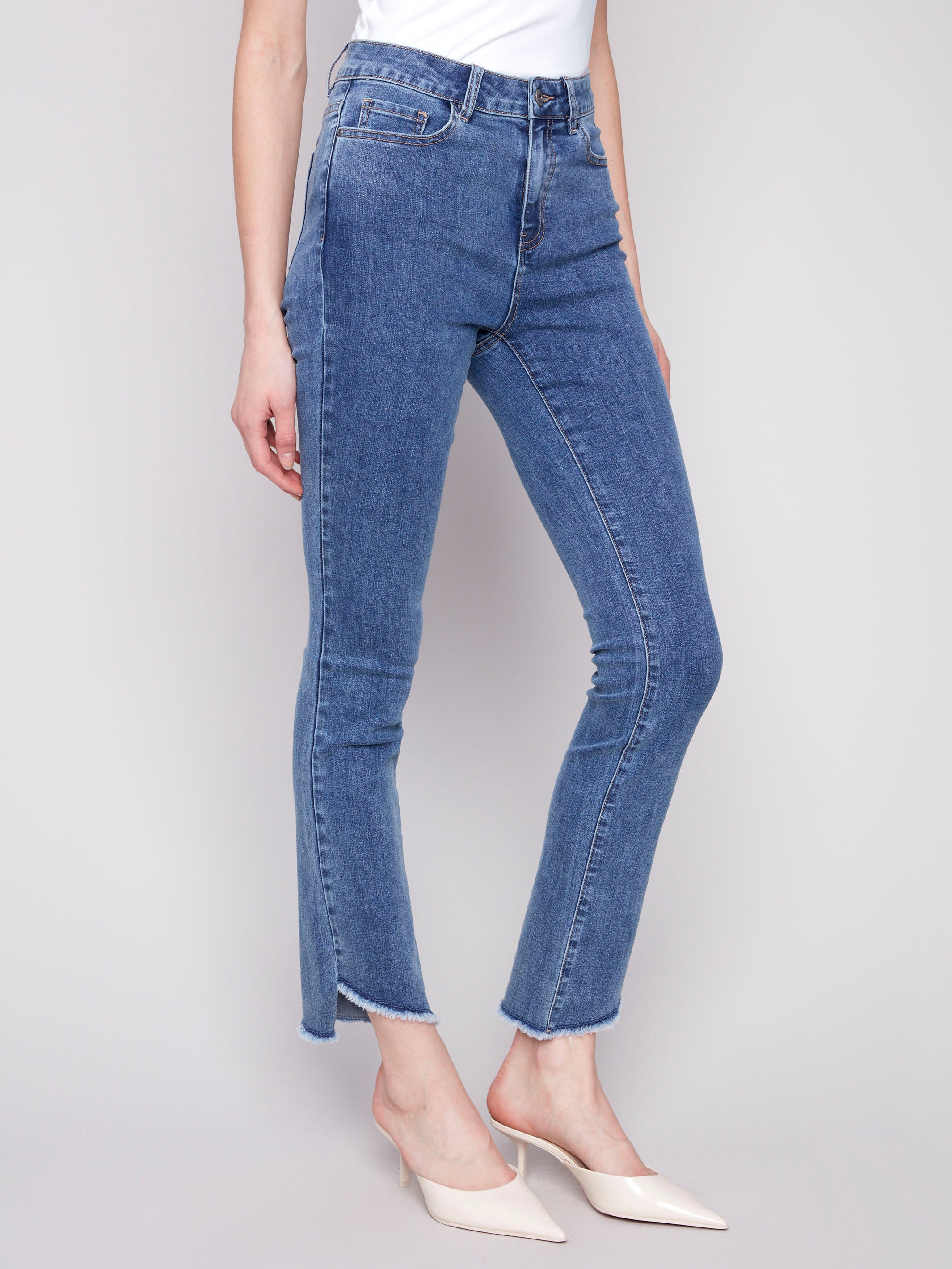 Stylish Bootcut Jeans with Asymmetrical Hem in Medium Blue Wash - Perfect for Casual Outings & Night Out Looks