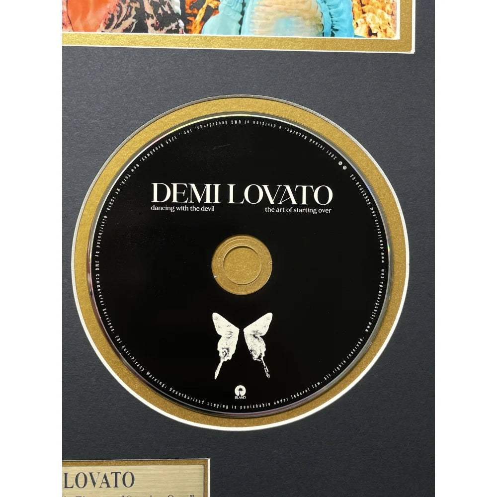 Demi Lovato Autographed Dancing Devil CD Album - PSA/DNA Certified Signed Memorabilia - Framed Collage Display for Music Fans & Collectors - Perfect for Home, Office, or Gift