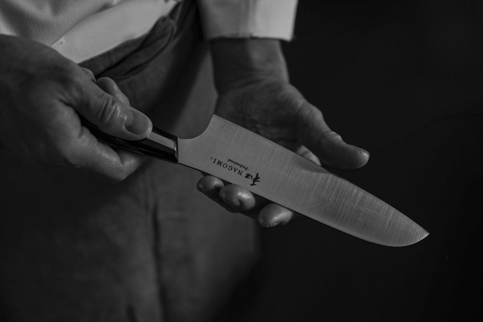 Nagomi Japan Professional 7-Inch Santoku Knife - High Carbon Stainless Steel Blade, Ergonomic Handle - Perfect for Slicing, Dicing, and Mincing Vegetables, Meat, and Fish