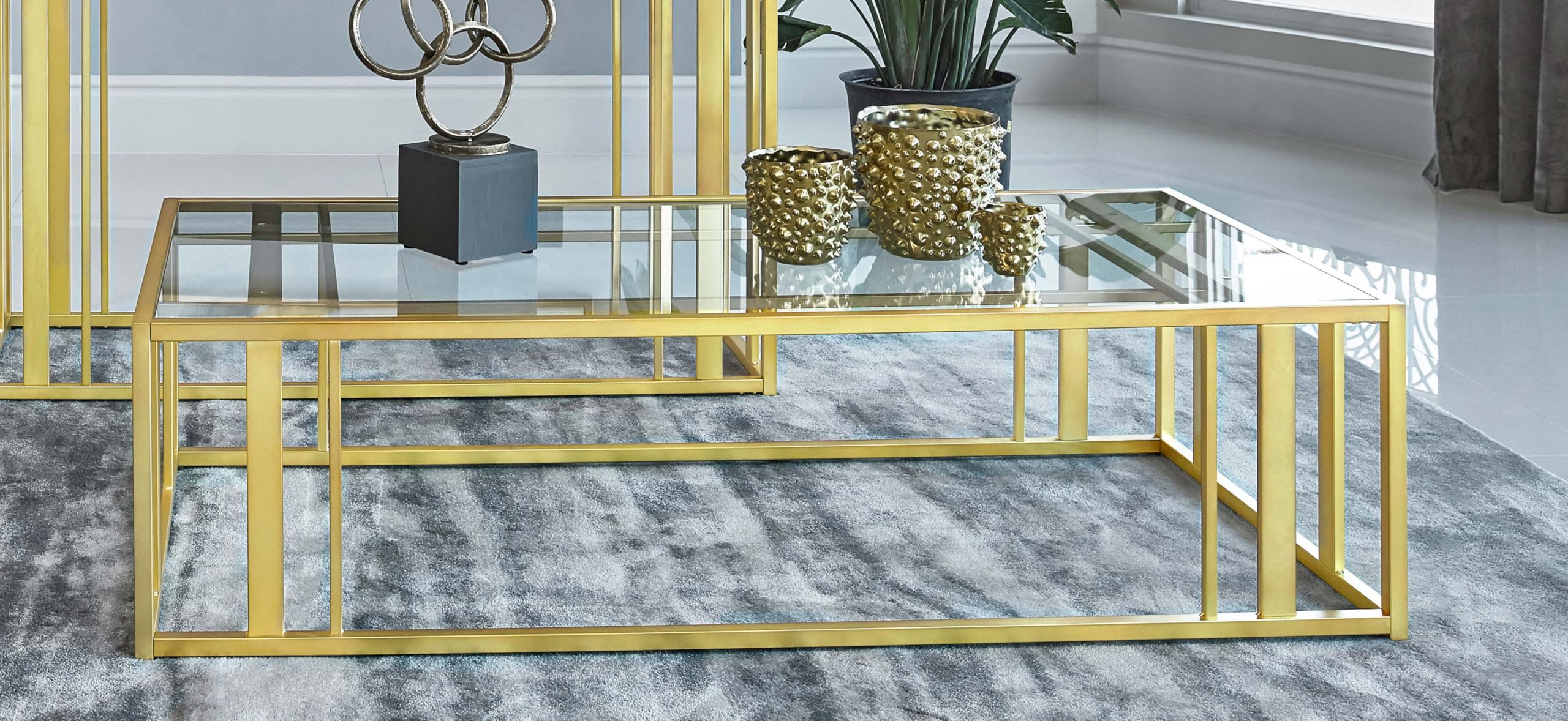 Modern Glass Coffee Table with Geometric Metal Base - Coaster Home Furnishings Adri Rectangular Coffee Table for Living Room, Bedroom, Office | Matte Brass Finish Glass Top End Table | Perfect for Small Spaces, Contemporary Decor & Entertaining Guests