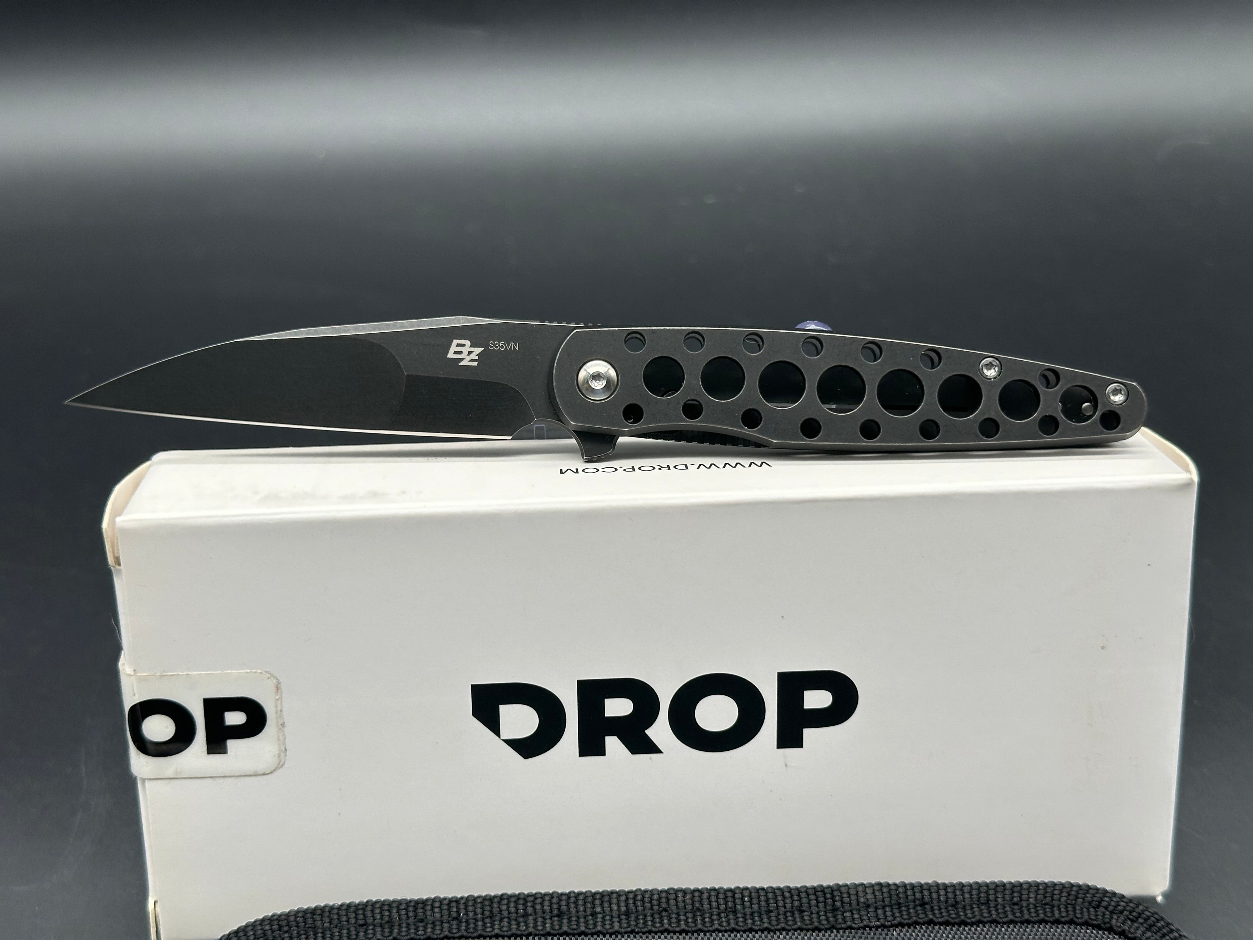 Premium Drop Zinker Dog Frame Lock Knife - Black Titanium Blade for Outdoor, Camping & EDC Use