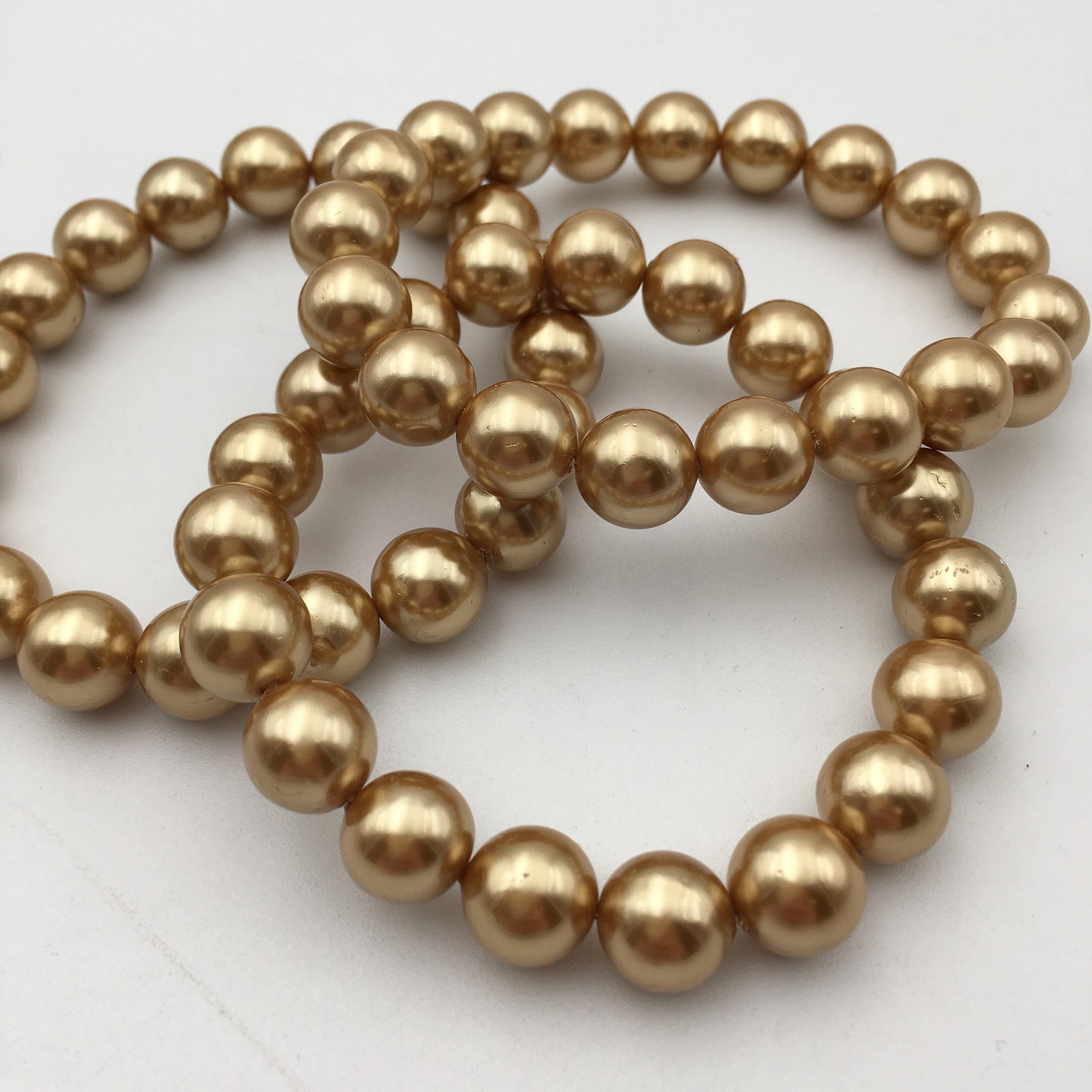 8mm & 10mm Gold Shell Pearl Bracelet - Smooth Round Beads - 7.5 Inch Adjustable Length - Perfect for Weddings, Parties & Elegant Everyday Wear