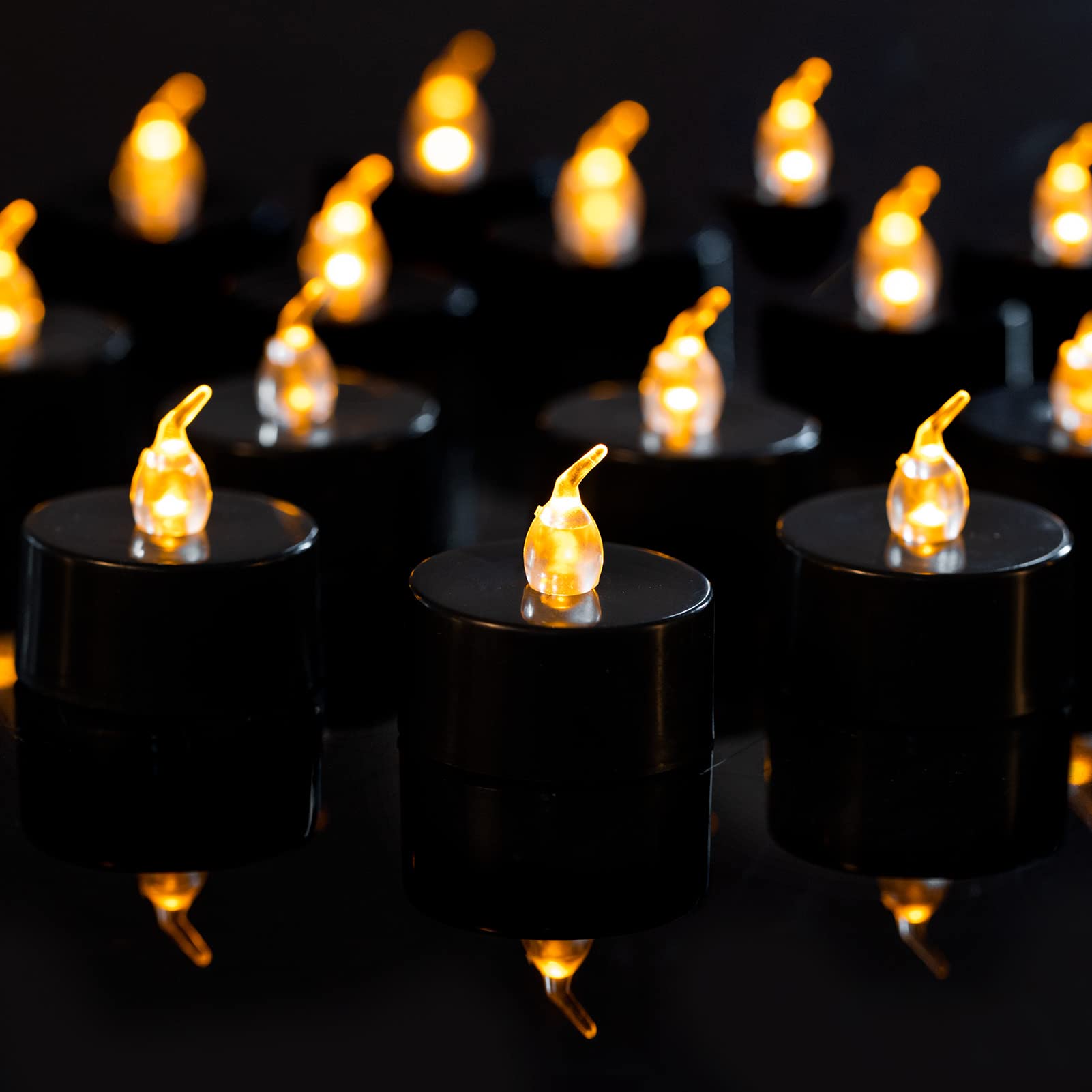 LANKER 24 Pack Black Tea Light Candles - Flameless LED Candles with Flickering Warm Yellow Flame, Battery Operated Fake Candles for Wedding, Halloween & Christmas Decor - Perfect for Centerpieces, Table Settings & Holiday Displays