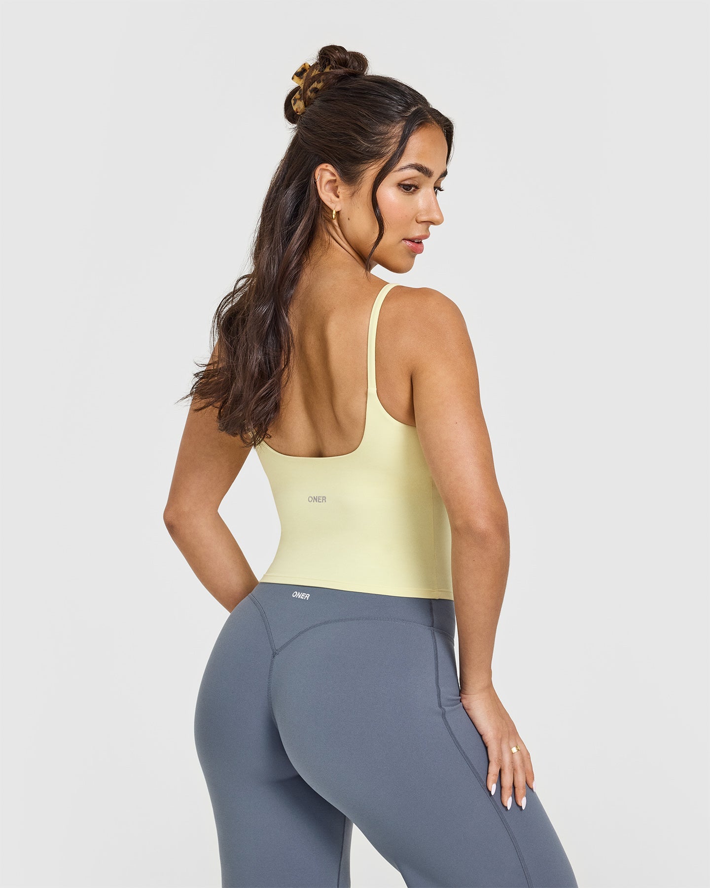SoftMotion™ Strappy Mid Vest with Built-in Bra Shelf - Pastel Yellow | Women's Activewear for Yoga, Running & Gym Workouts