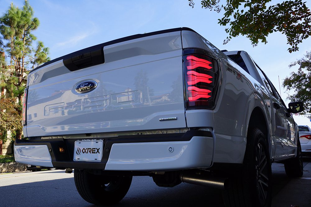 21 23 Ford F150 LUXX Series LED Tail Lights Alpha Black - High Performance LED Brake Lights for Ford Trucks - Perfect for Night Driving & Off-Road Adventures