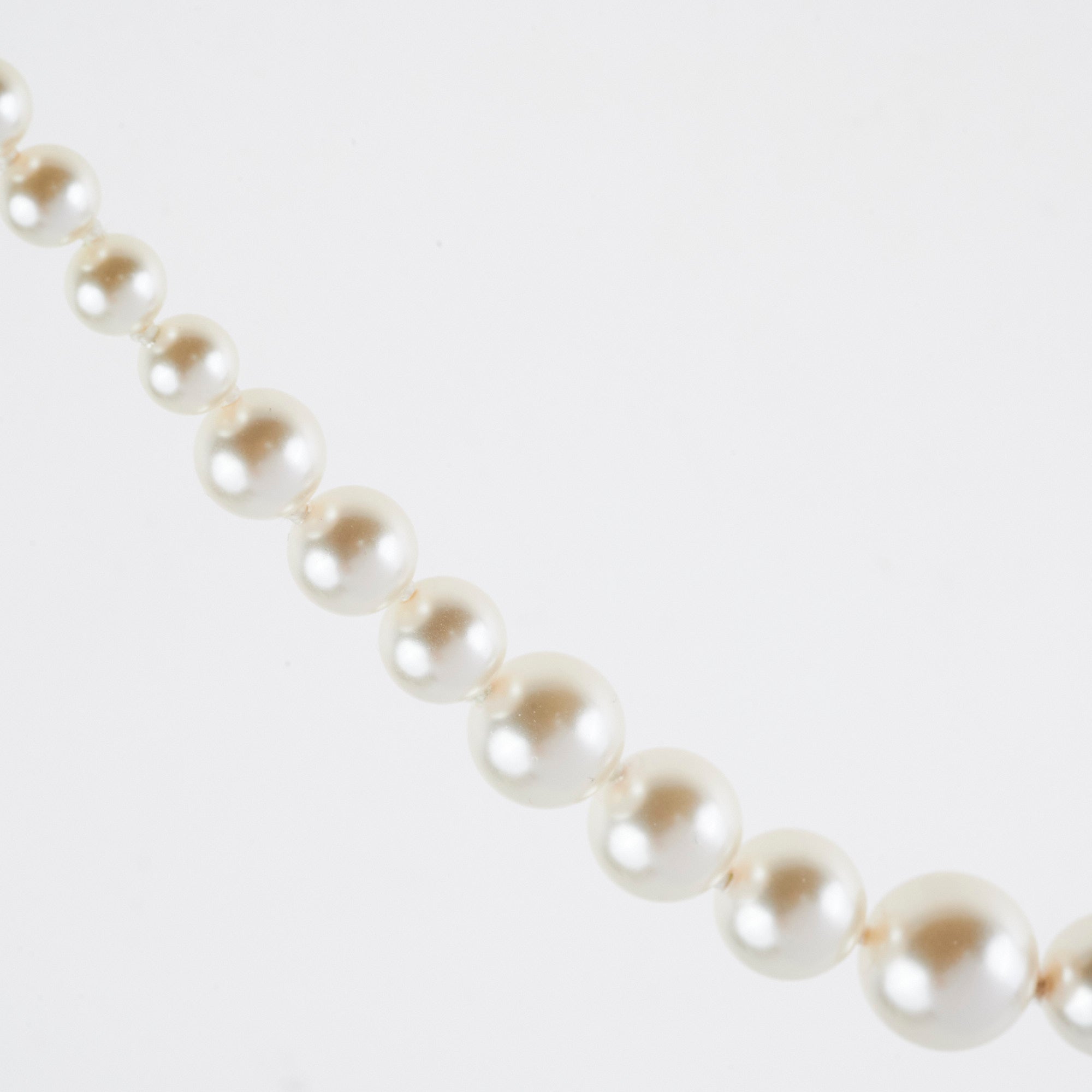 Chanel Long Pearl CC Logo Necklace - Elegant Costume Jewelry for Women | Perfect for Parties, Weddings & Special Occasions