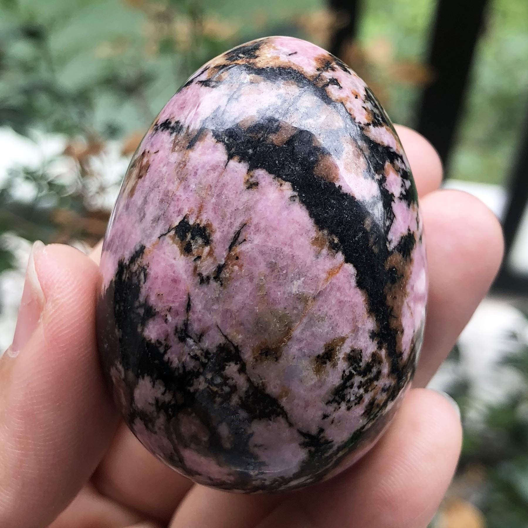 Healing Crystal Stone Egg Figurine - Polished Rhodonite Easter Egg Sphere Sculpture with Wooden Stand (1.8 Inch) - Meditation Decor, Reiki Healing Tool, Feng Shui Home Decoration, Unique Gift Idea