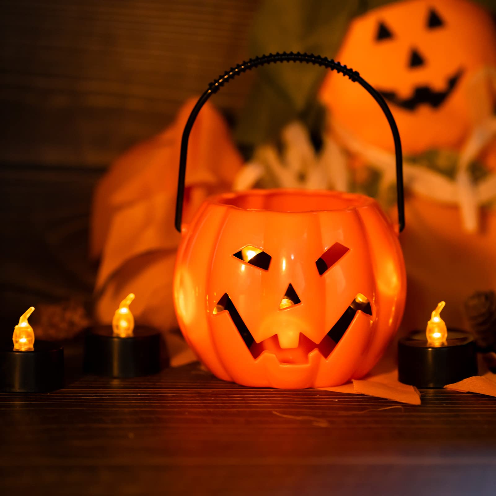 LANKER 24 Pack Black Tea Light Candles - Flameless LED Candles with Flickering Warm Yellow Flame, Battery Operated Fake Candles for Wedding, Halloween & Christmas Decor - Perfect for Centerpieces, Table Settings & Holiday Displays