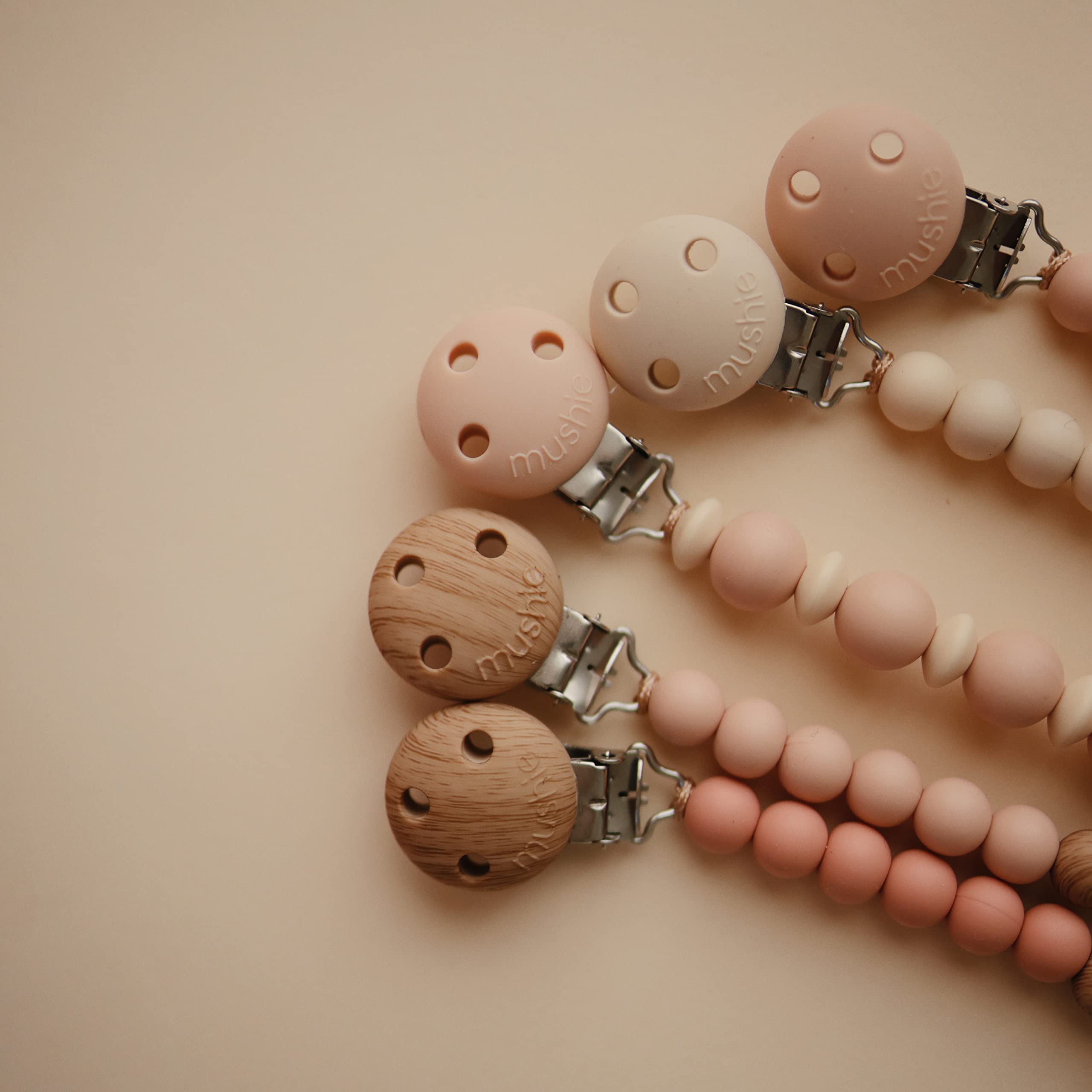 Mushie 100% Silicone Baby Pacifier Clip - BPA Free, Non-Toxic | Hera (Shifting Sand) | Secure Pacifier Holder for Infants & Toddlers - Perfect for Strollers, Car Seats & On-The-Go