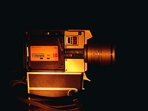 Vintage Home Comforts Filmadora Camera & Reflex Lens - 20x30 Inch Laminated Poster with Vibrant Colors - Perfect for Photography Studios, Living Room Decor, or Gift for Photographers