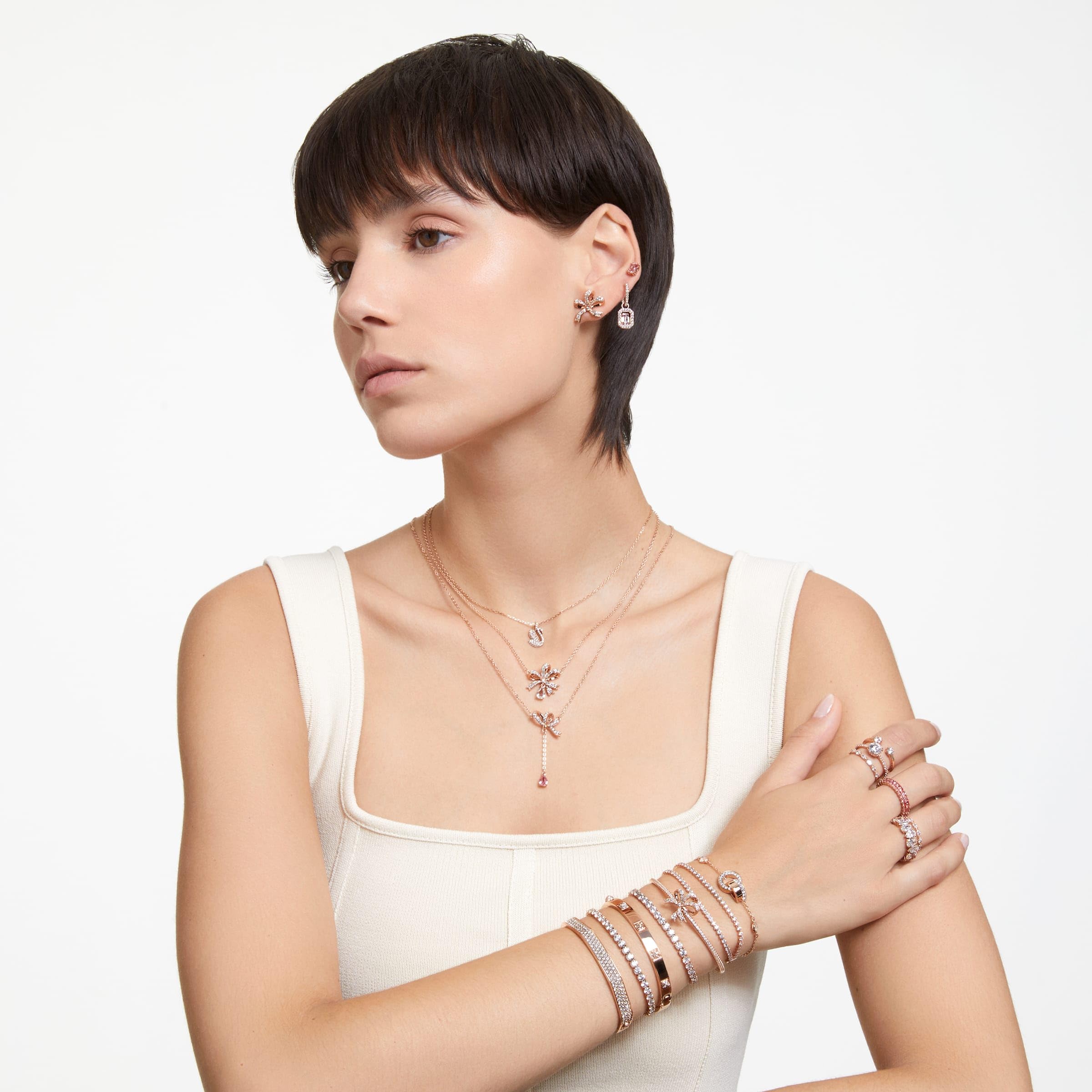 Swarovski Volta Bangle Bracelet with Bow Charm - White Crystals & Rose Gold Plated for Women | Elegant Gift for Wedding, Anniversary & Special Occasions
