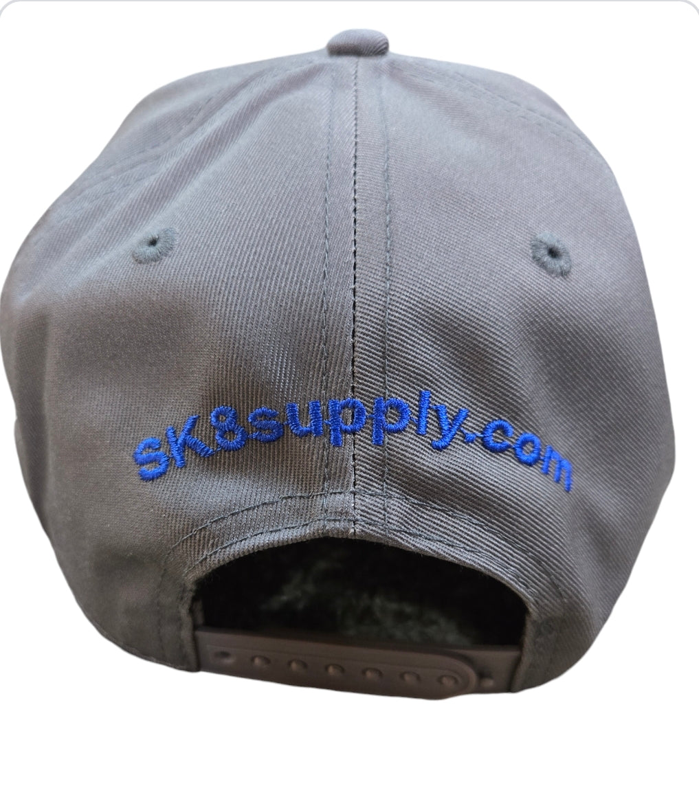 SK8SUPPLY Wes Humpston Skull Logo Canvas Snapback Hat - Gray Blue | Vintage Skateboard Style for Streetwear & Urban Fashion