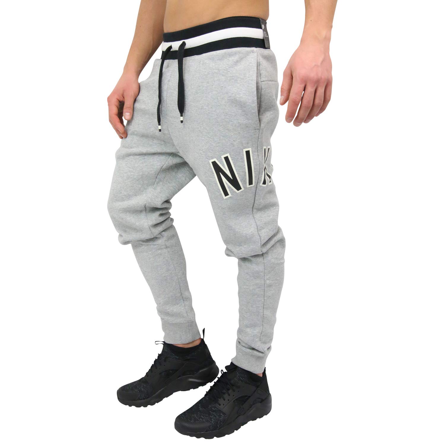 Nike Air Fleece Pants for Men & Women - Comfortable Athletic Joggers with Elastic Waistband - Perfect for Running, Gym Workouts & Lounge Wear