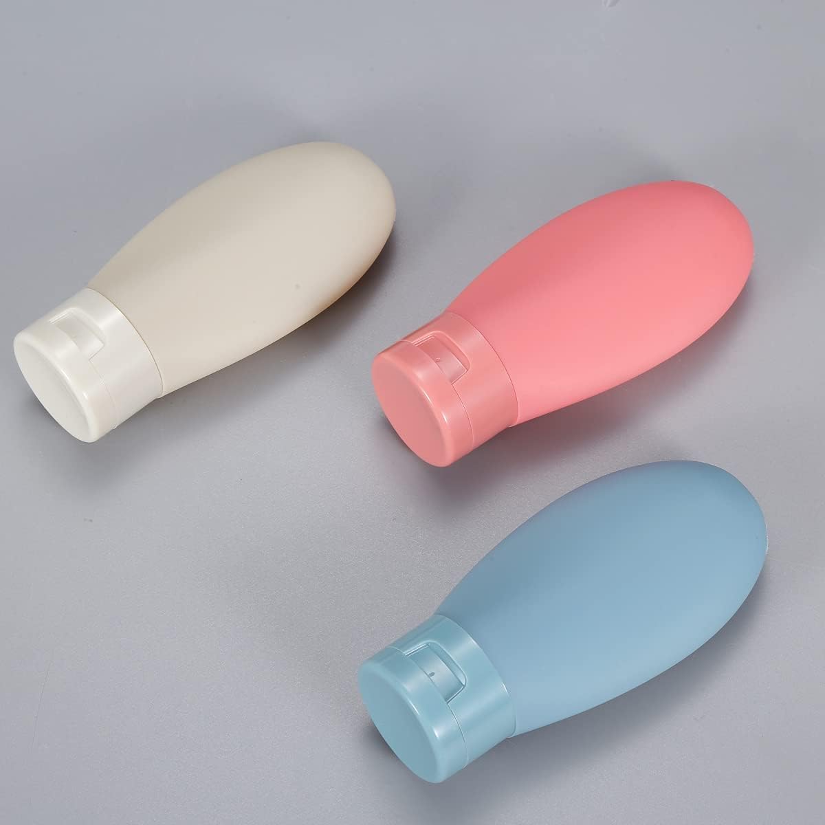 DOCAT 3-Pack Silicone Travel Bottles for Toiletries - 60ml Leakproof Portable Containers for Shampoo, Lotion, Cream & Hand Wash | Perfect Travel Essentials for Women | Ideal for Airplane Carry-On, Gym Bag & Vacation Packing