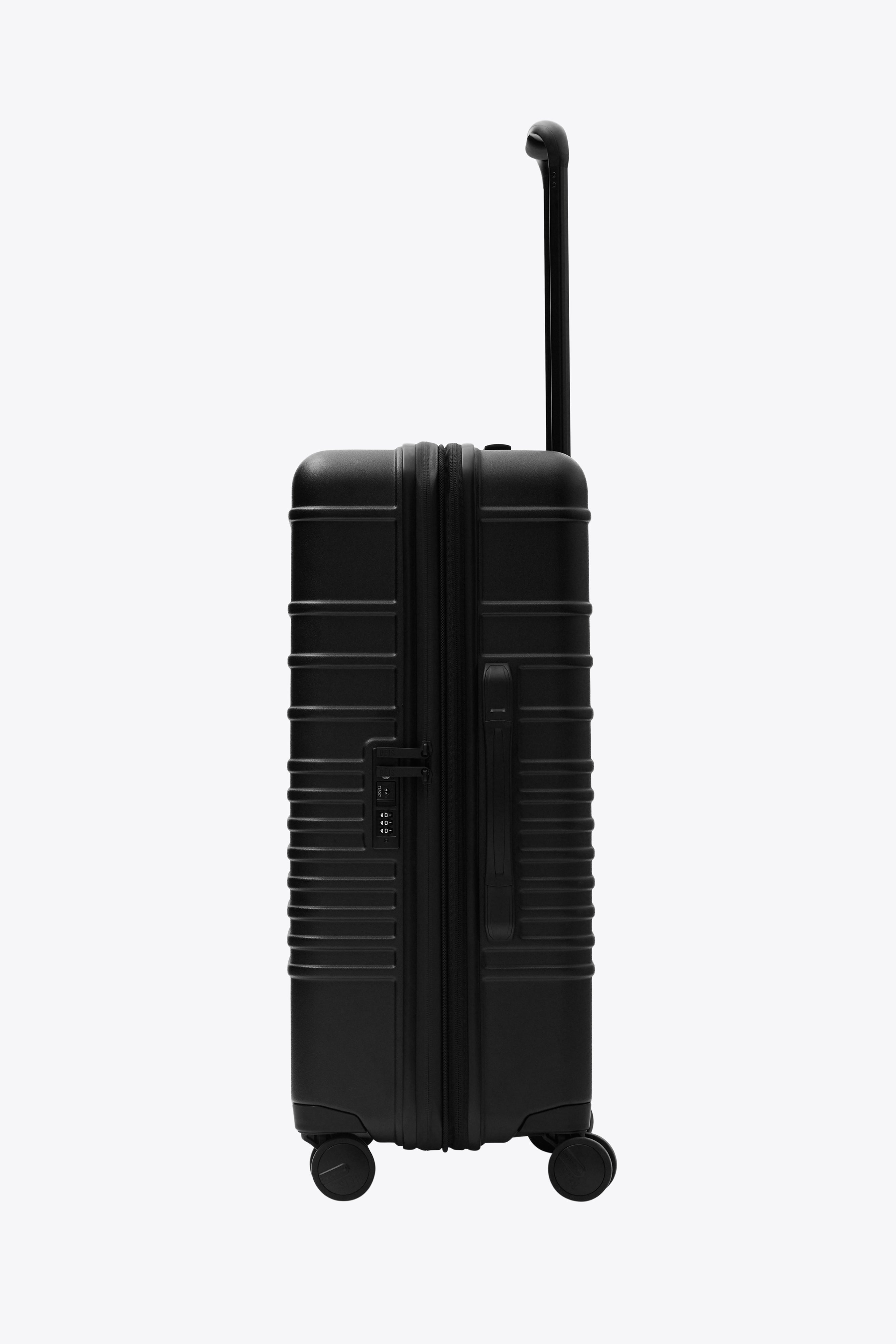 All Black Medium Check-In Roller Luggage - Perfect for Business Travel & Weekend Getaways