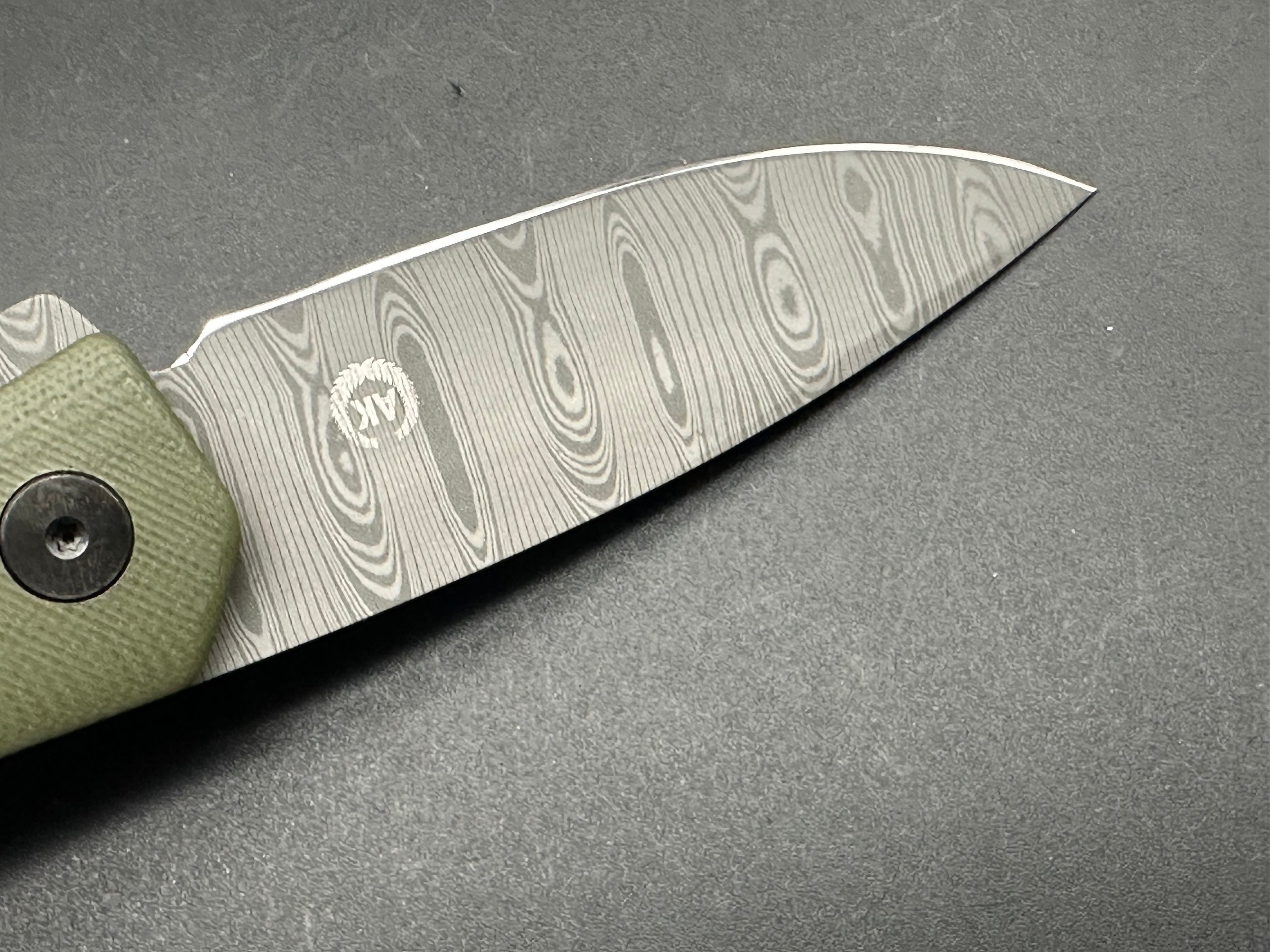 Asher Knives The Spiro Flipper Folding Pocket Knife - OD Green G10 Handle, S35VN Steel Blade, Laser Ladder Damascus Pattern - EDC, Outdoor, Camping, Survival Gear