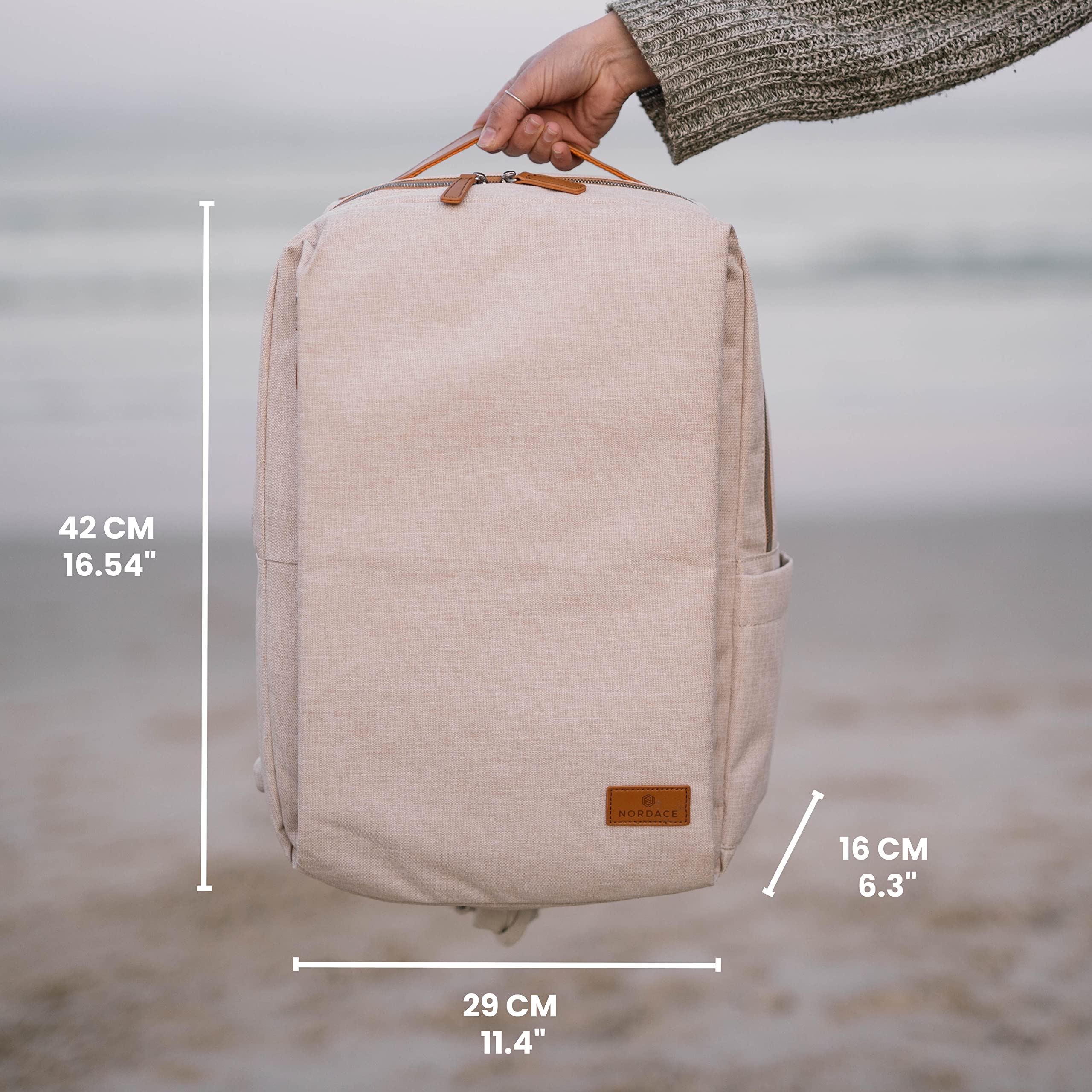 Nordace Siena Smart Backpack with USB Charging Port - 15.6 Inch Laptop Backpack for Men & Women, 19L Lightweight Travel Backpack for Work, School, Commuting & Everyday Use (Beige) | Durable & Water-Resistant