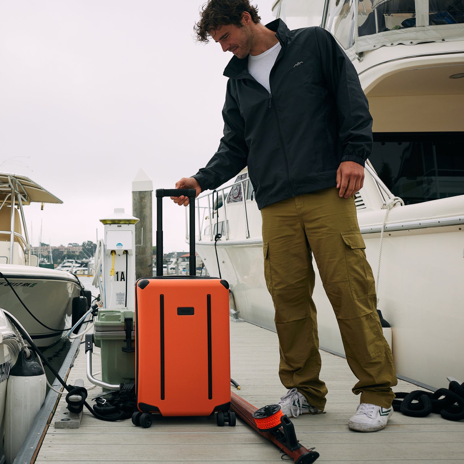 The Ridge Carry On Basecamp Orange - Durable Travel Backpack for Outdoor Adventures, Hiking & Camping Gear - Perfect for Weekend Getaways & Airplane Carry-On Luggage