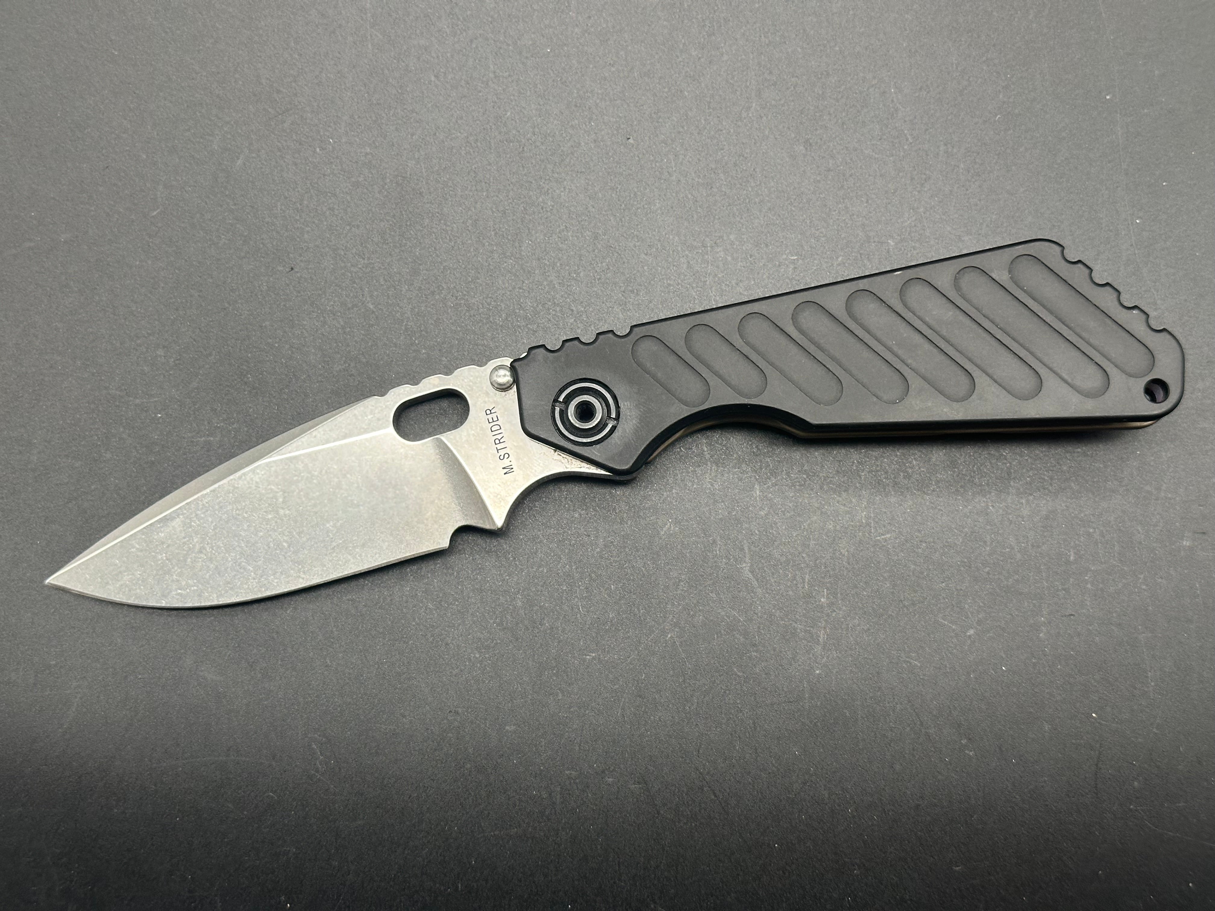 Strider SNG Knife with Logo - Black Aluminum & Flamed Titanium Handle - CPM20CV Steel Blade - EDC Tactical Folding Knife for Outdoor, Camping, and Survival