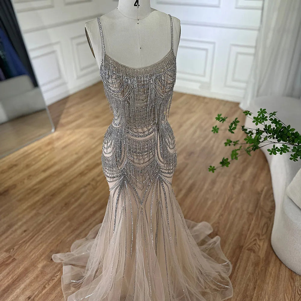 Elegant Silver Nude Spaghetti Strap Mermaid Evening Gown with Beaded Tassels - Dubai Luxury Formal Dress for Prom, Gala & Special Occasions - LA72772