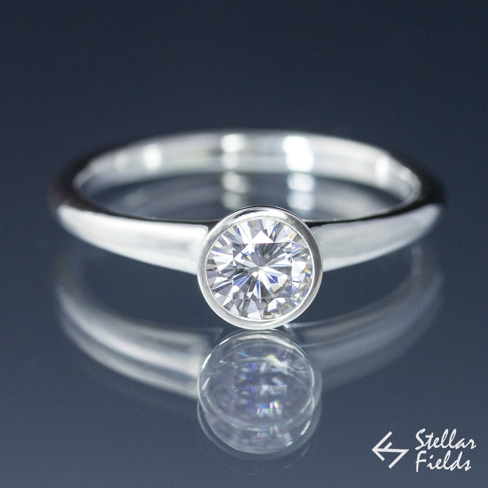 Forever One™ Round Moissanite Solitaire Bezel Engagement Ring - 14K White Gold Wedding Band for Women, Durable & Sparkling Diamond Alternative - Perfect for Proposals, Anniversaries & Special Occasions