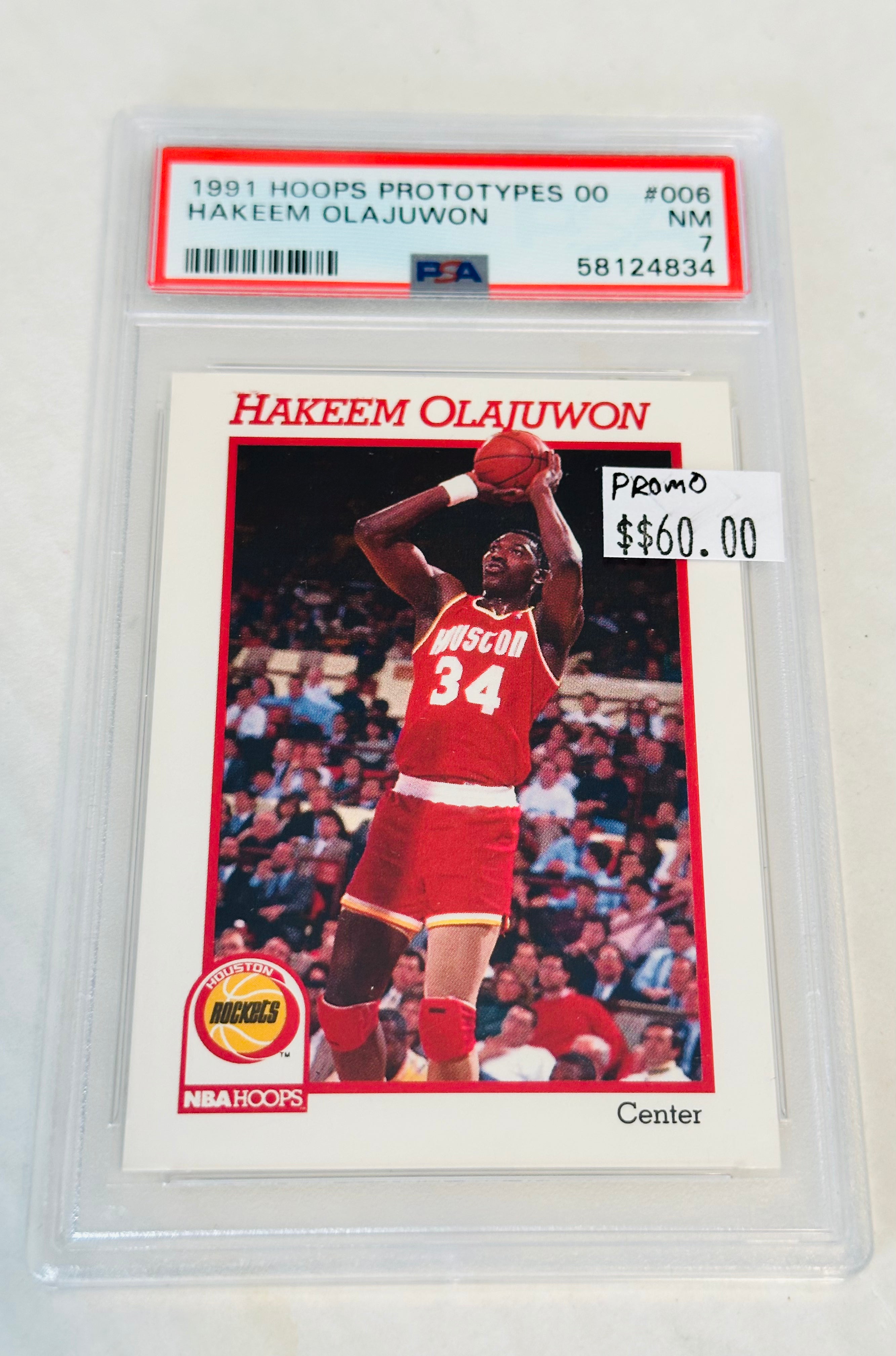 Rare Hakeem Olajuwon Graded PSA 7 Basketball Card - Authentic NBA Hoops Promo Collectible for Sports Memorabilia Fans & Card Collectors - Perfect for Display, Investment, and Gift Giving