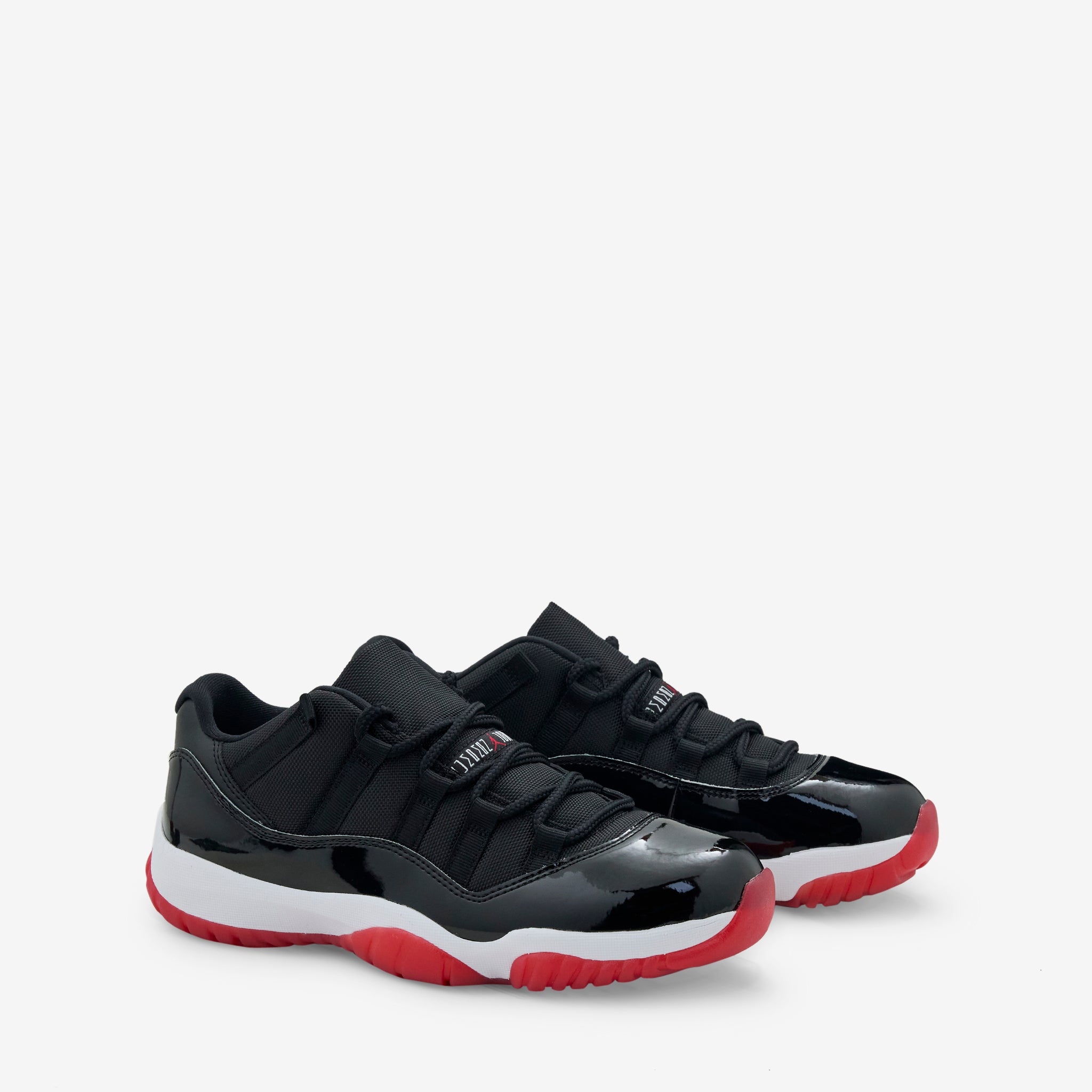 Air Jordan 11 Retro Low 'Bred' Men's Basketball Shoes - Black/Varsity Red/White | Classic Sneakers for Streetwear & Court Performance