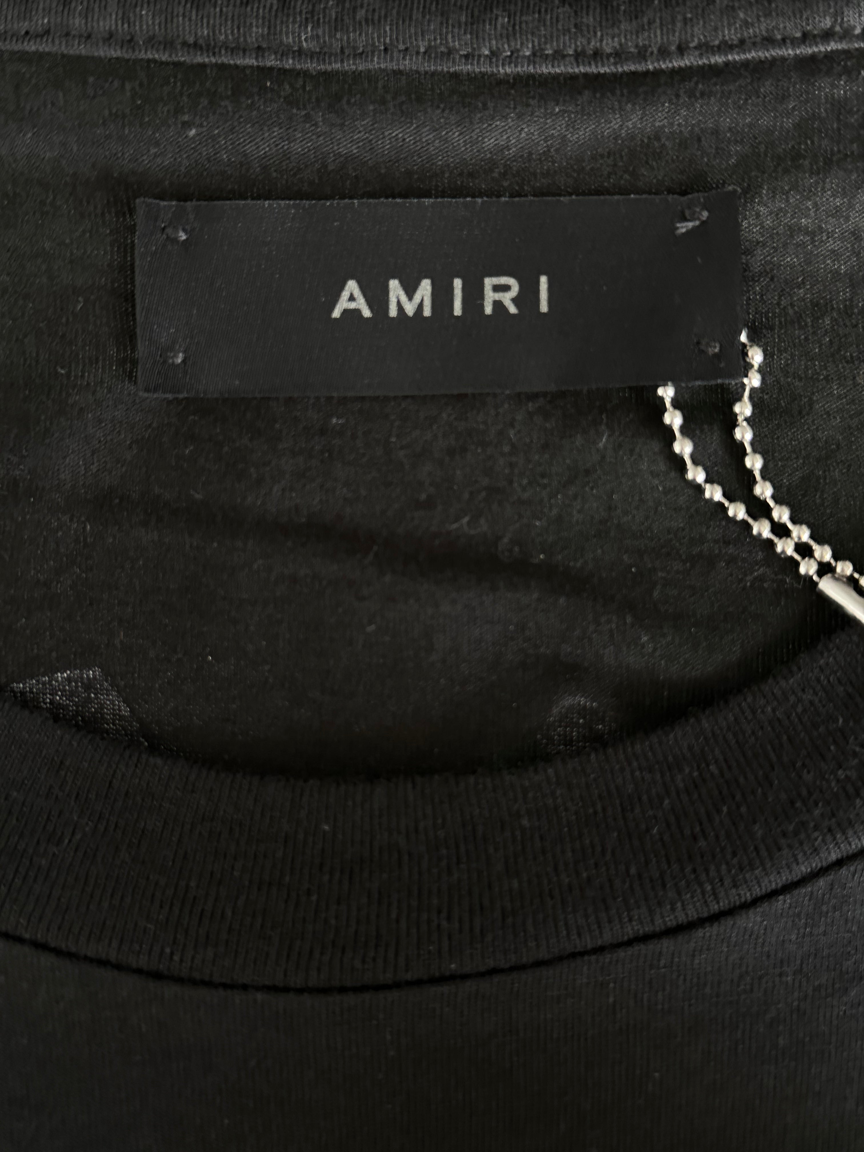 Amiri Black & White Los Angeles Exclusive Bones Graphic T-Shirt for Men - Stylish Streetwear for Casual Outings & Nightlife