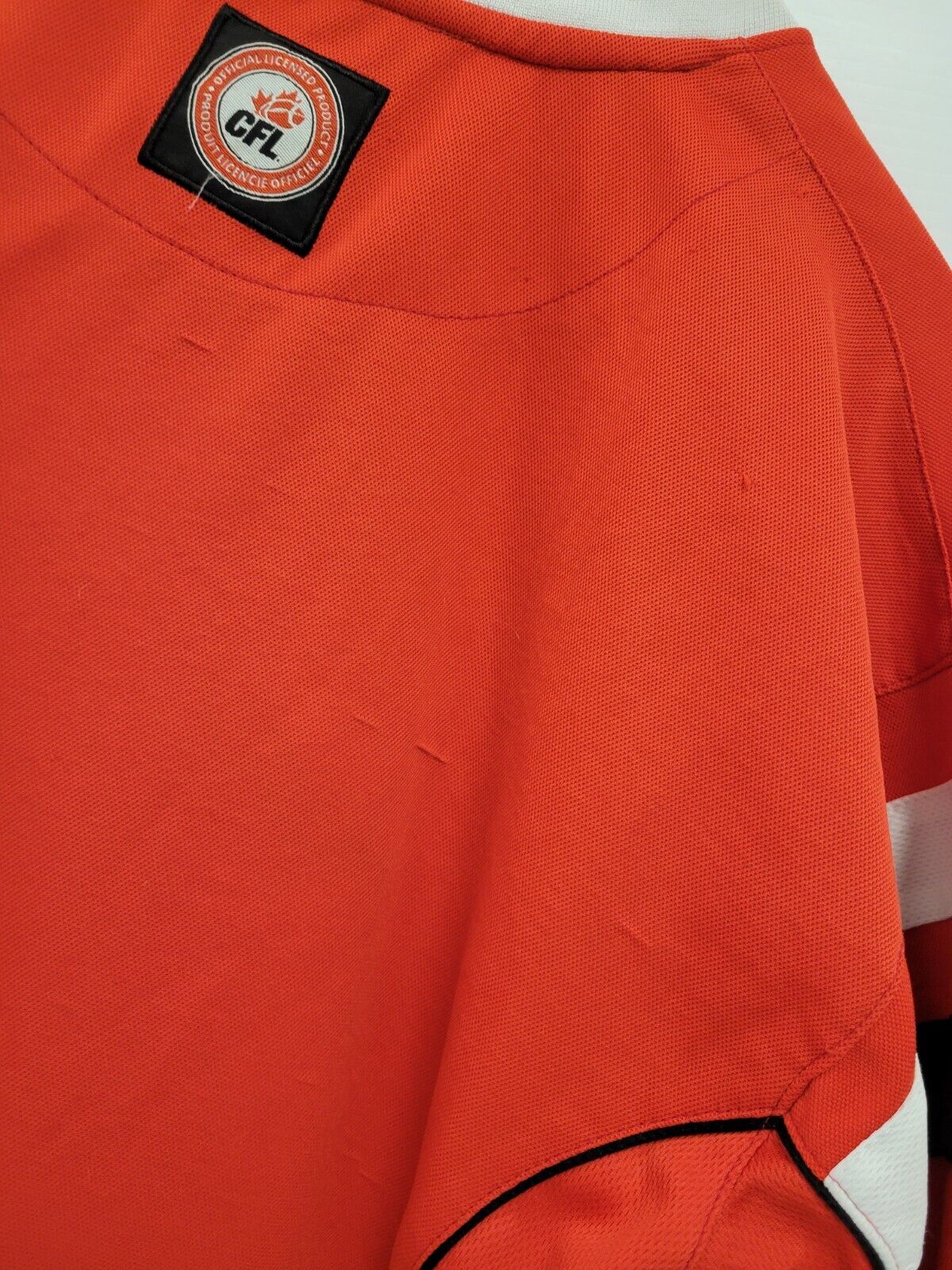 Official Calgary Stampeders CFL Football Jersey - Size Large for Men - Perfect for Game Day, Tailgating & Fan Events