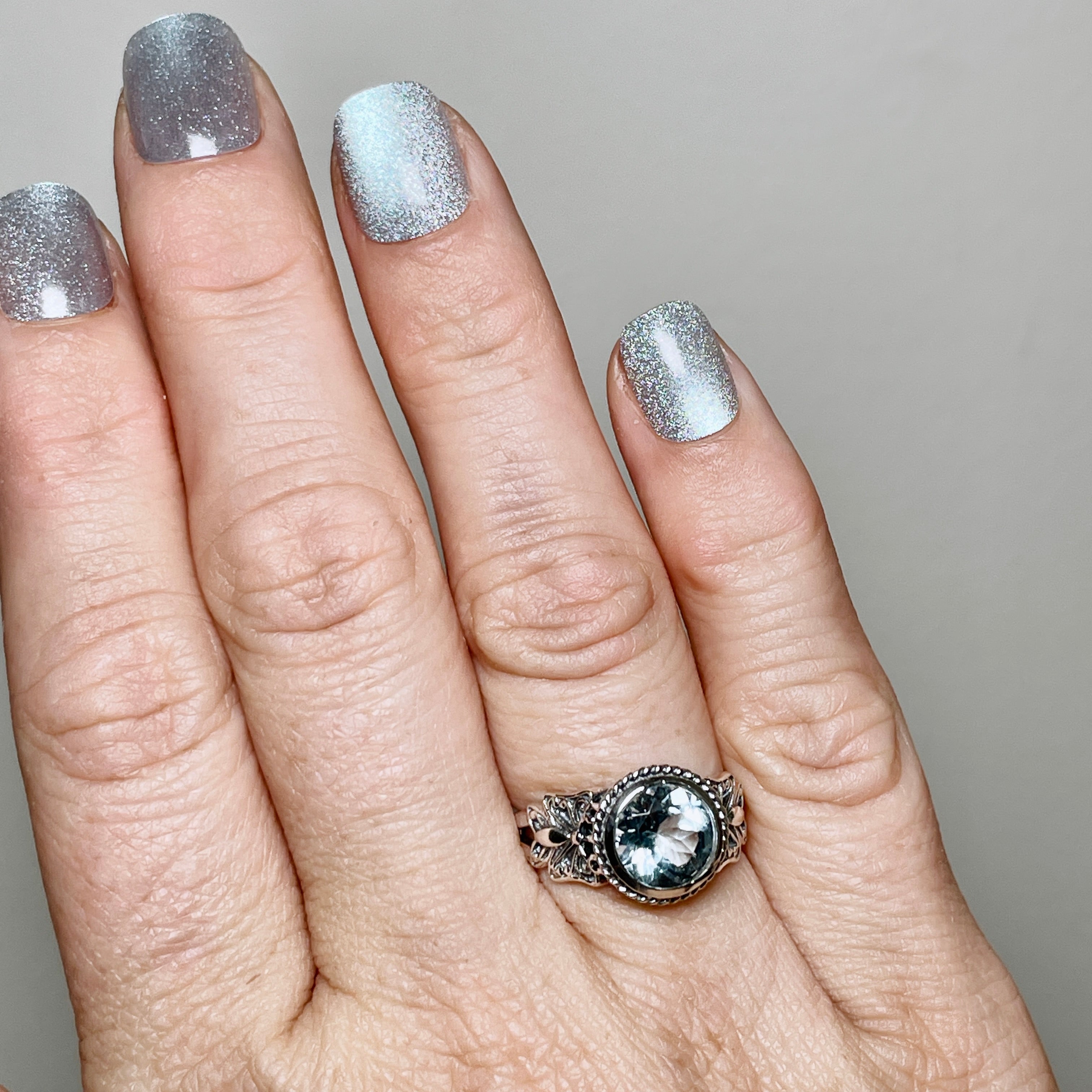 Blue Topaz Faceted Round Ring in Sterling Silver - Elegant Jewelry for Women, Perfect for Weddings, Anniversaries & Special Occasions