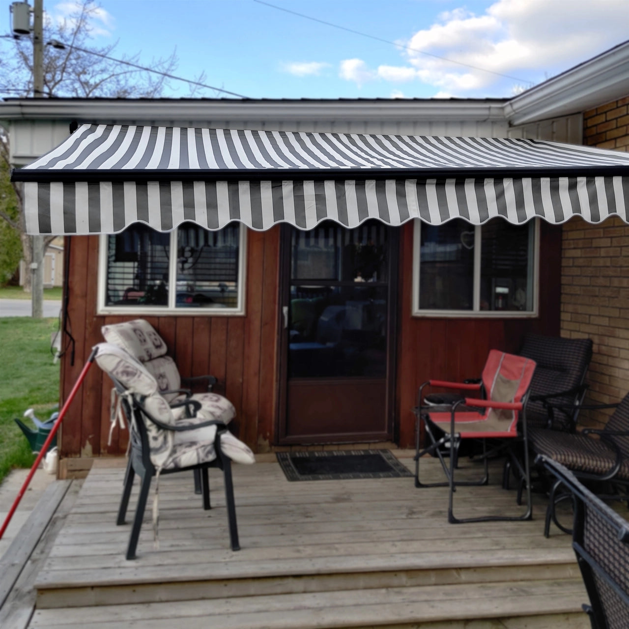 Aleko 16x10 Feet Motorized Retractable Patio Awning - Black Frame with Gray & White Stripes - Perfect for Outdoor Shade, Deck, Garden, and Backyard Relaxation