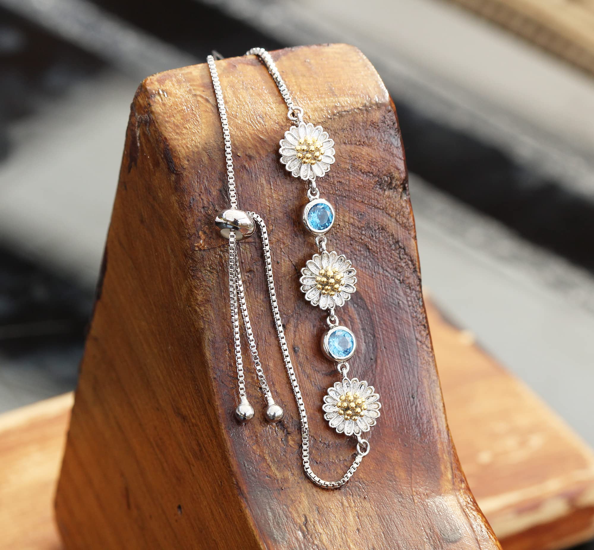 Kaguya Sterling Silver Daisy Bracelet for Women - Adjustable Infinity Bracelet with Blue Zirconia Blossom, Dainty Friendship Jewelry Gift for Her - Perfect for Birthday, Anniversary & Everyday Wear
