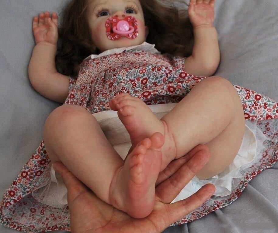 Anano 24 Inch Lifelike Reborn Baby Doll - Realistic Silicone Toddler Doll with Vivid Veins, Wrinkles & Rooted Long Hair | Includes 2 Baby Teeth & Lovely Daisy Outfit | Perfect for Collectors, Gift Giving & Role Play Scenarios