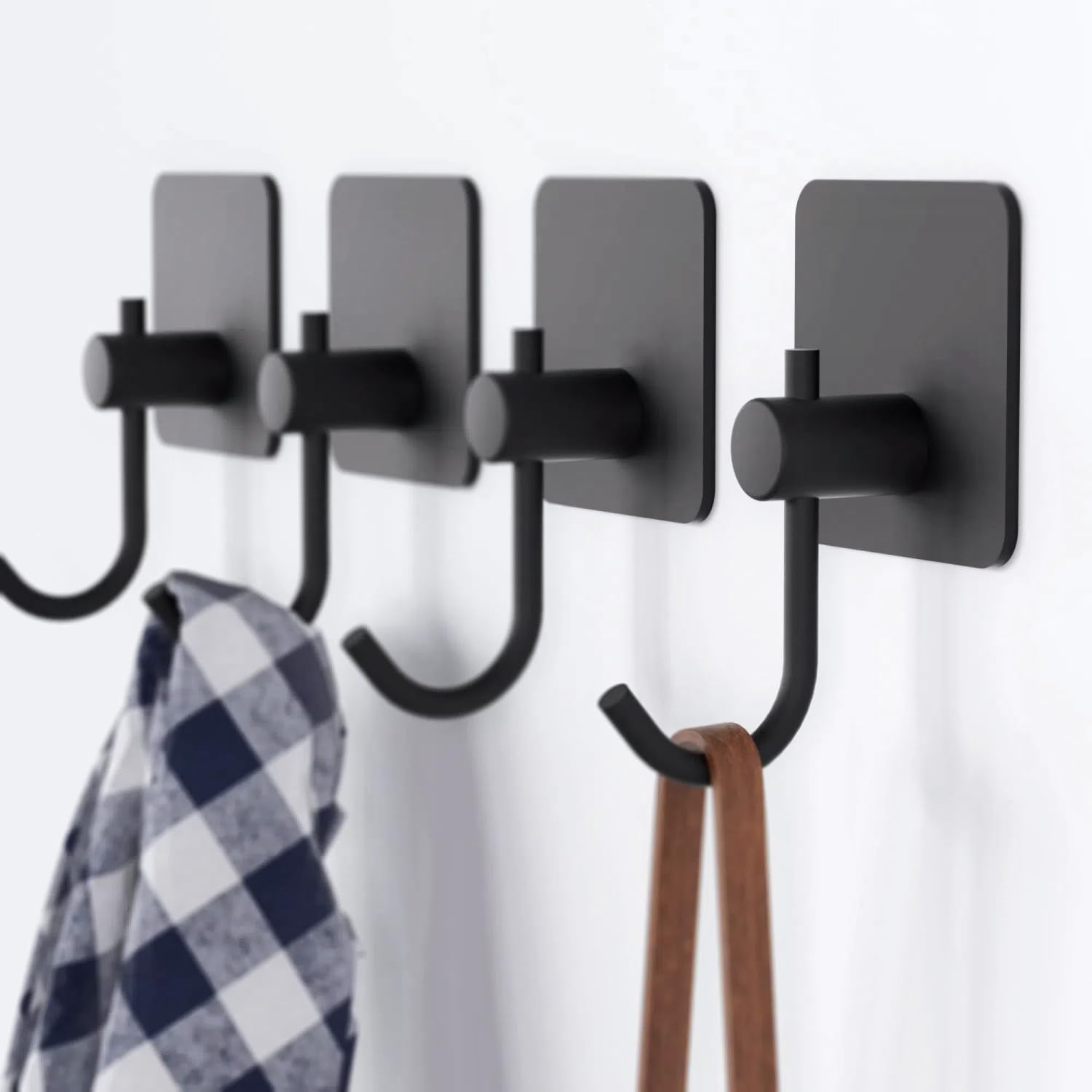 Self Adhesive Towel Hooks for Bathroom - 4 Pack Black Wall Mounted Hooks, Strong Adhesive Hand Towel Holder for Hanging Bath Towels, Robes & Lightweight Clothing - Perfect for Bathroom, Closet, Cabinet & Behind Doors (Ideal for Small Spaces & Organization)
