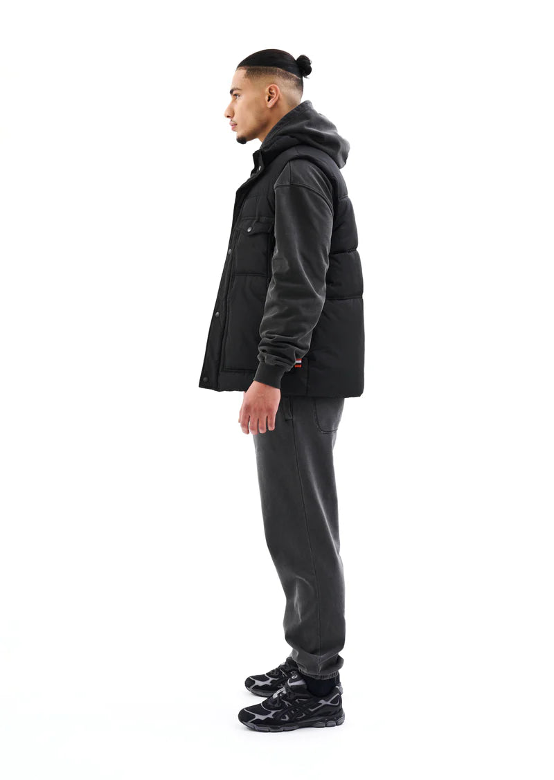 Black Cutback Vest for Men & Women - Stylish Layering Piece for Outdoor Adventures & Casual Wear