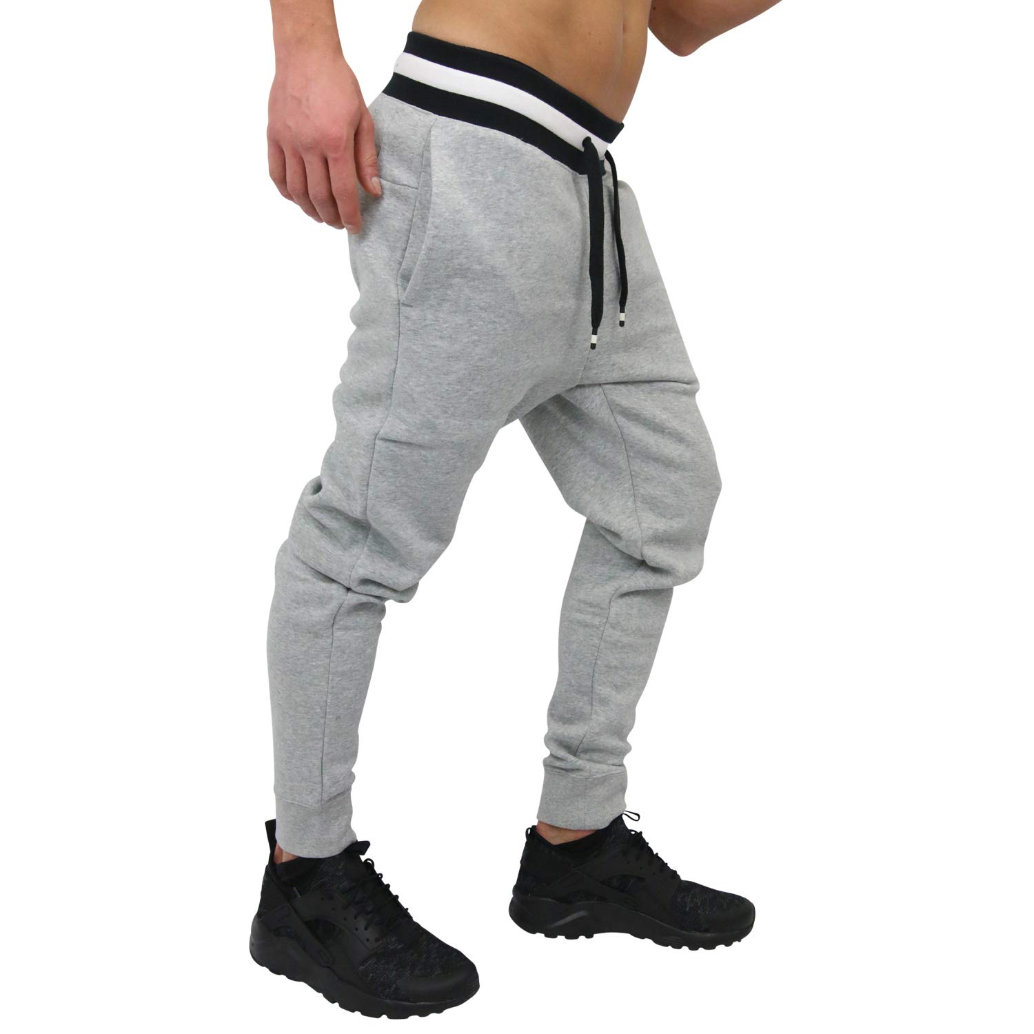 Nike Air Fleece Pants for Men & Women - Comfortable Athletic Joggers with Elastic Waistband - Perfect for Running, Gym Workouts & Lounge Wear