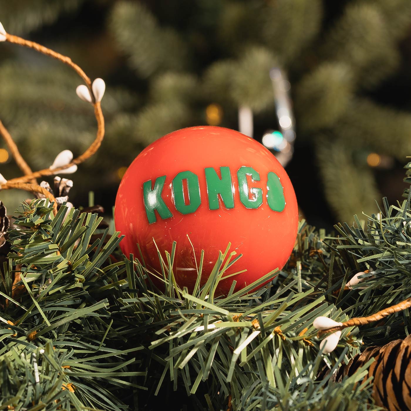 KONG Holiday Dog Chew Toys - 4 Pack Durable Rubber Balls for Chewing, Fetch & Play - Christmas, Thanksgiving & New Year Pet Gifts for Small & Large Dogs