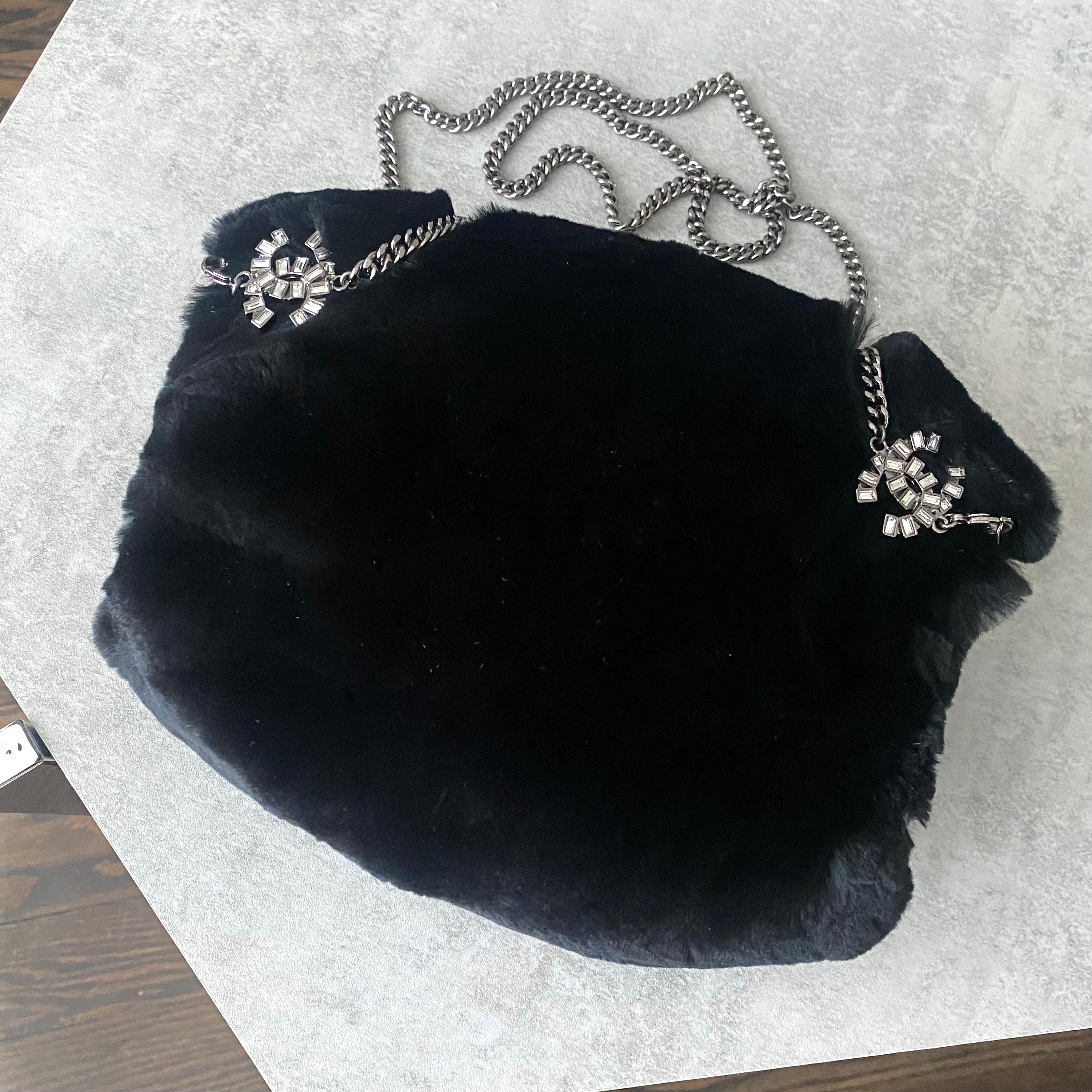 Chanel Black Fur Muff with Crystal CC Chain - Luxury Winter Hand Warmer for Women, Perfect for Cold Weather & Fashion Accessories