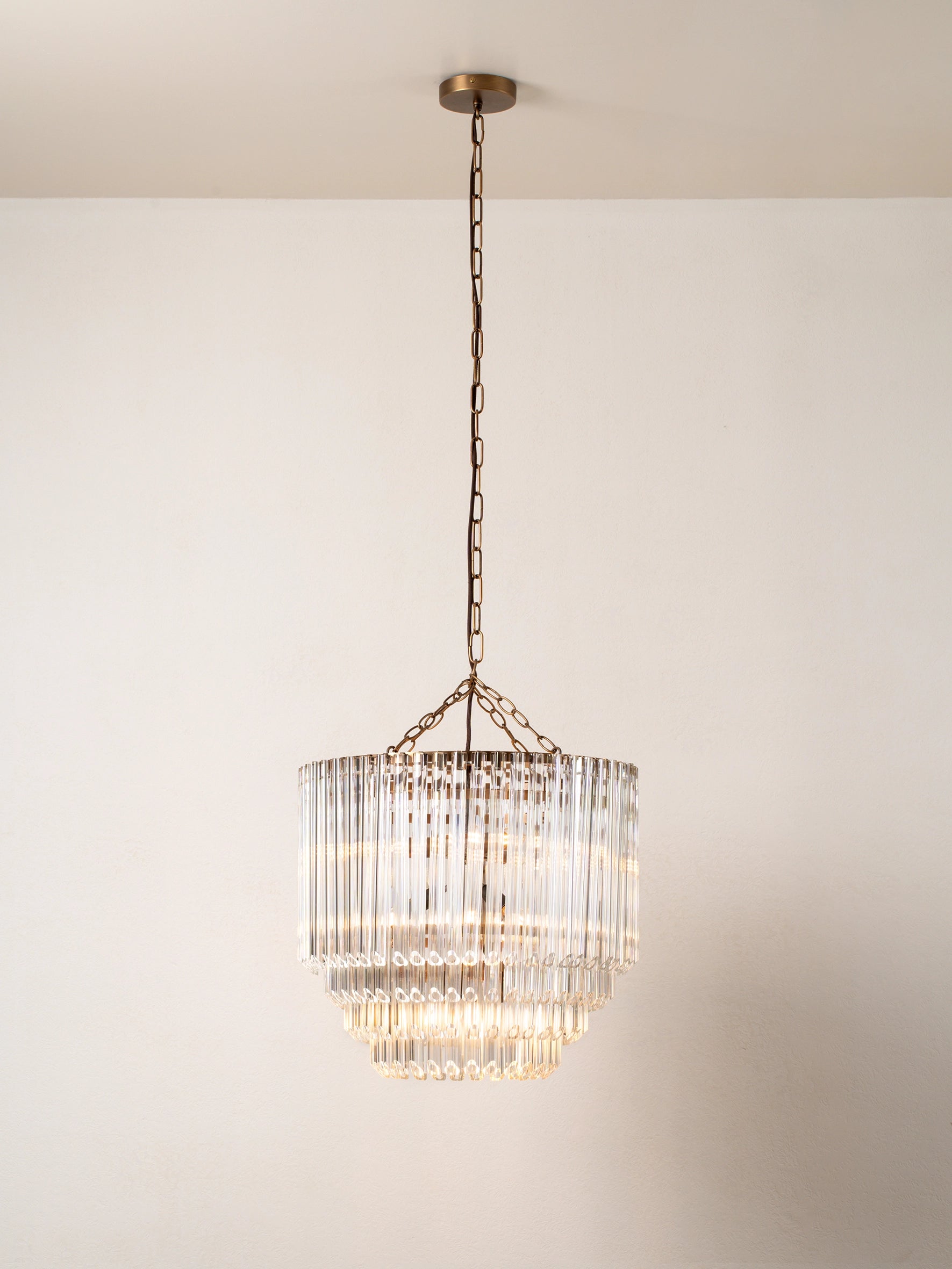 Petalia 9-Light Aged Brass and Clear Glass Tube Tall Chandelier - Elegant Dining Room Lighting for Modern Farmhouse & Luxury Home Decor