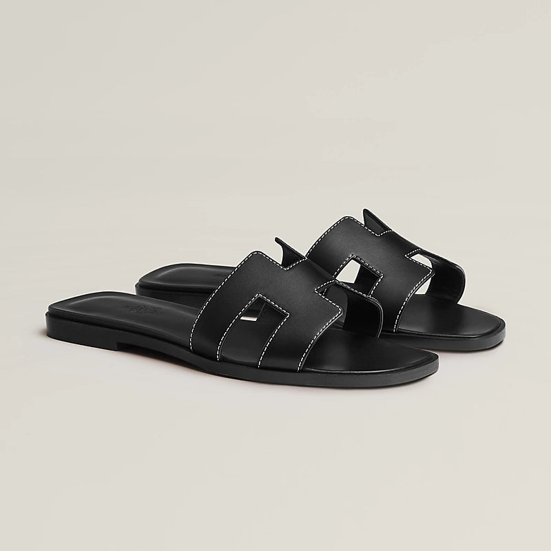 HERMES ORAN SANDALS in Noir - Luxury Leather Slide Sandals for Women | Perfect for Summer, Beach, and Casual Outings