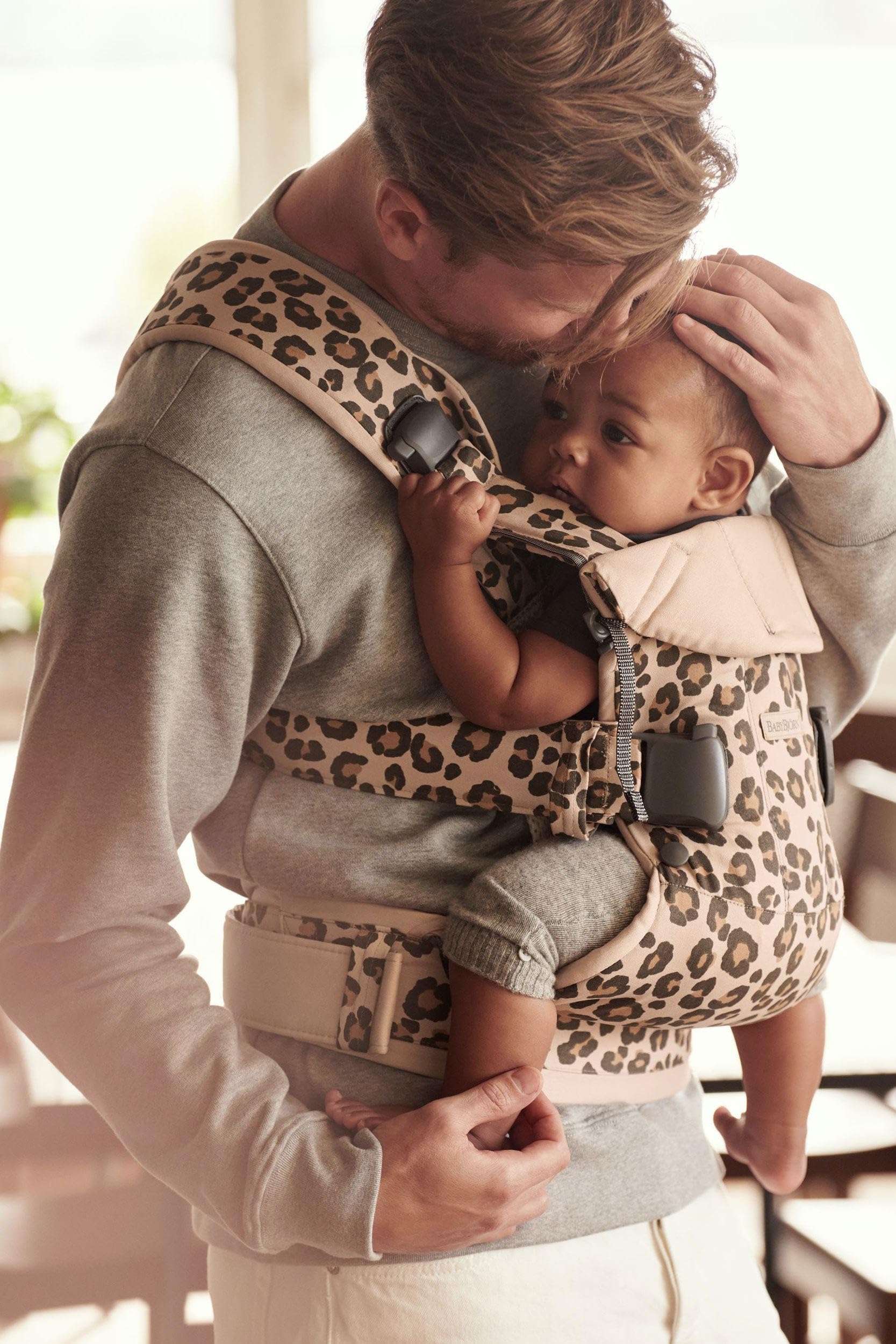 BabyBjörn Baby Carrier One - Soft Cotton Infant Carrier in Beige/Leopard Print - Ergonomic & Hands-Free for Newborns to Toddlers - Perfect for Shopping, Hiking & Daily Parenting