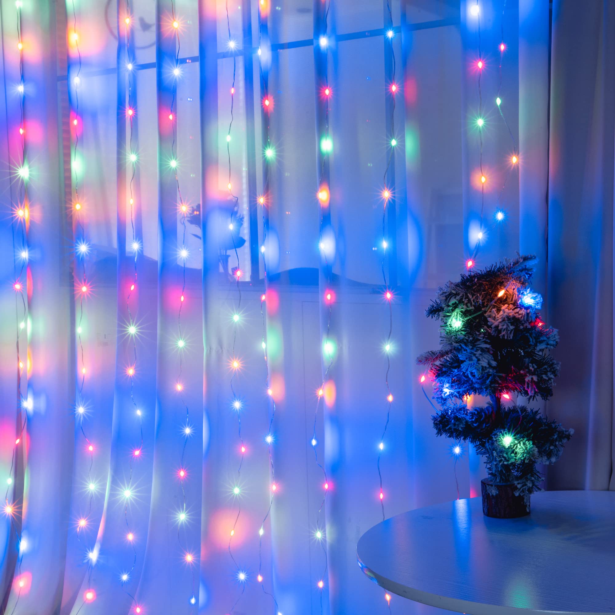 Hopolon 300 LED Window Curtain String Lights with Remote Control, 8 Lighting Modes, USB Powered Waterproof Fairy Lights for Christmas Decorations, Bedroom, Party, Wedding, Home, Garden & Wall Decoration (Multicolor) - Perfect for Indoor and Outdoor Holiday Lighting, Romantic Ambiance, and Festive Celebrations