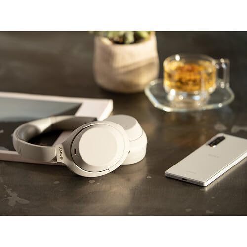 Sony WH-1000XM4 Wireless Noise Canceling Over-Ear Headphones with Built-in Mic, Alexa Voice Control, Hi-Res Audio - Silver (Includes USB Charger & Cleaning Cloth) - Perfect for Travel, Work & Home Office Use