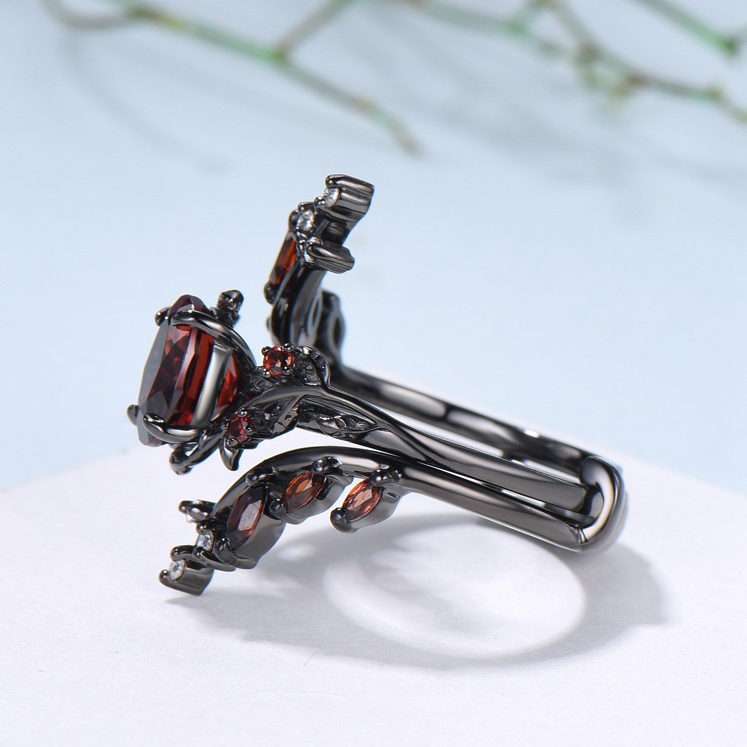 Black Gold Oval Garnet Engagement Ring Set - Nature Inspired Leaf & Vine Design, Gothic Wedding Jewelry with January Birthstone - Perfect for Romantic Proposals, Gothic Weddings & Unique Anniversary Gifts
