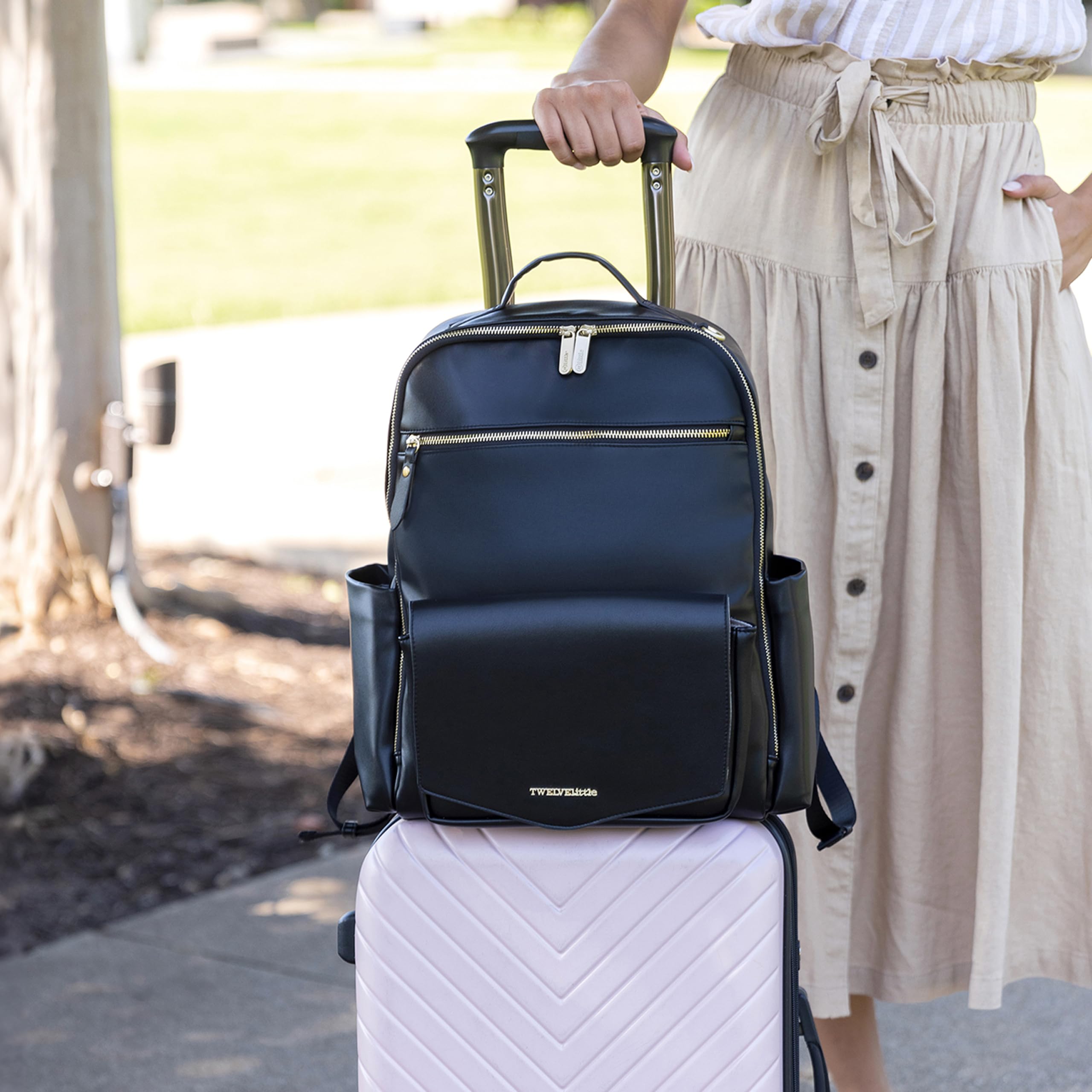 **Vegan Leather Diaper Backpack for Baby - TWELVElittle Peek A Boo Backpack with Stroller Clips, Wipes Pouch & Changing Pad (Black, One Size) - Perfect for Travel, Daycare & On-the-Go Parents**